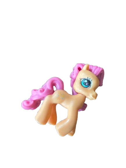 Toy pony with pink mane and tail, peach body, and a large blue eye.