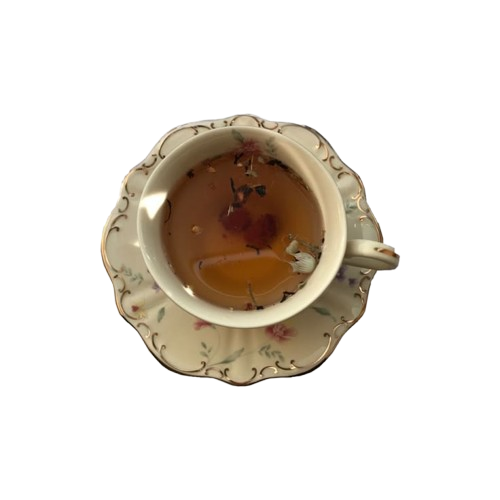 Empty decorative teacup with floral pattern, viewed from above.