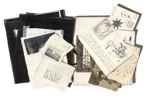 A collection of black and white photographs, sketches, and postcards scattered on a surface.