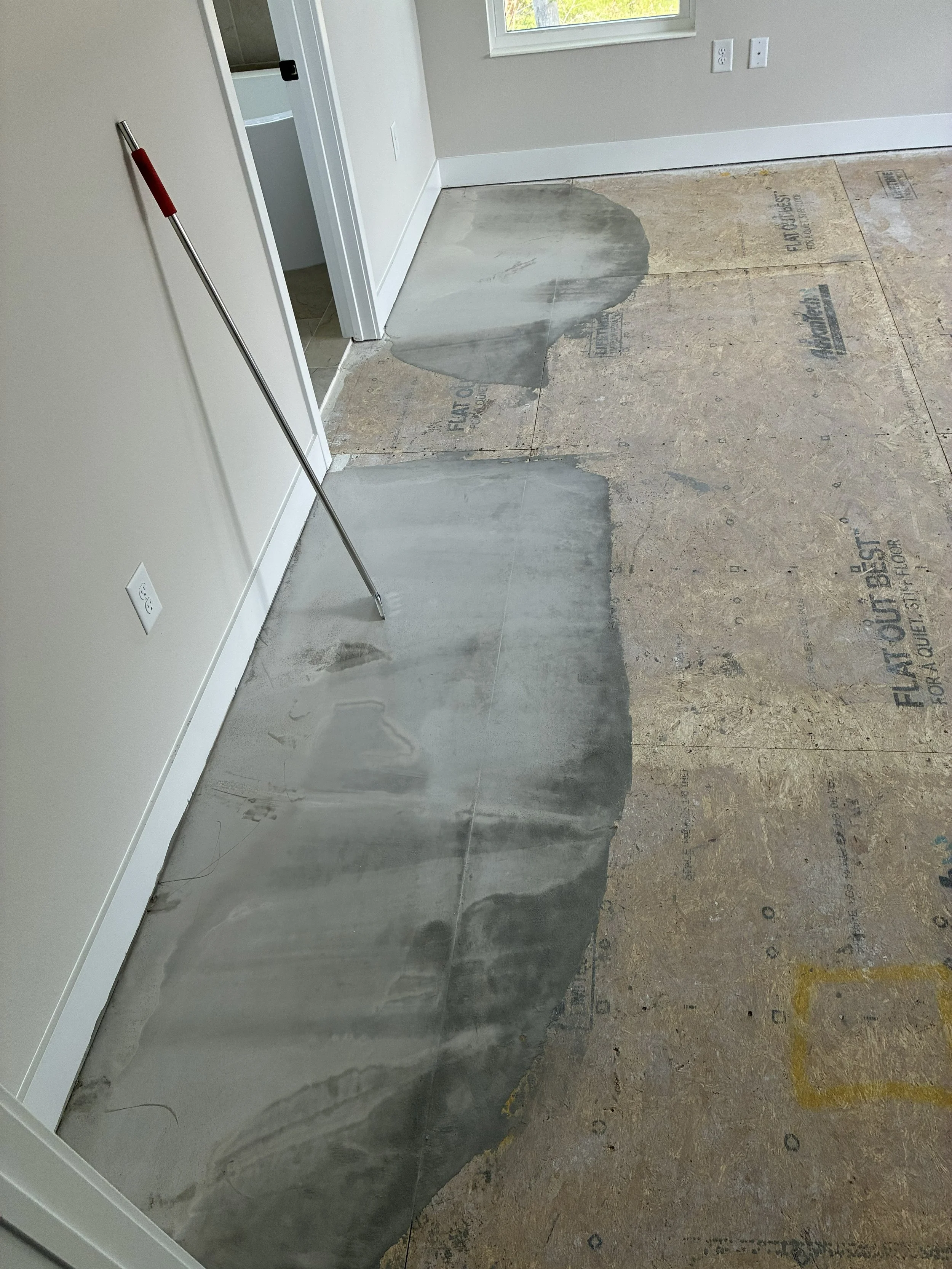 Concrete grinding and leveling to eliminate high and low spots before installation