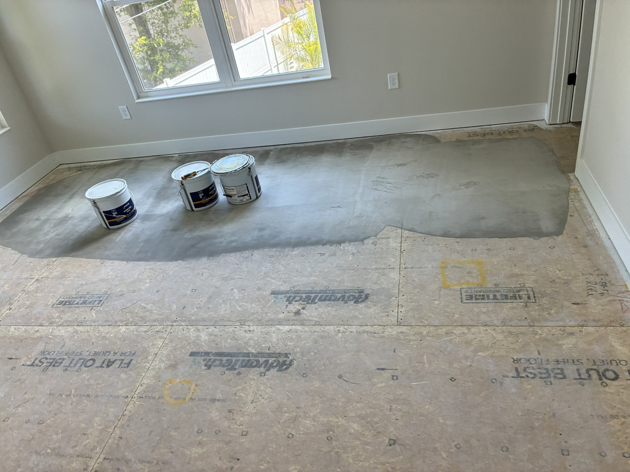 Concrete grinding and leveling to eliminate high and low spots before installation