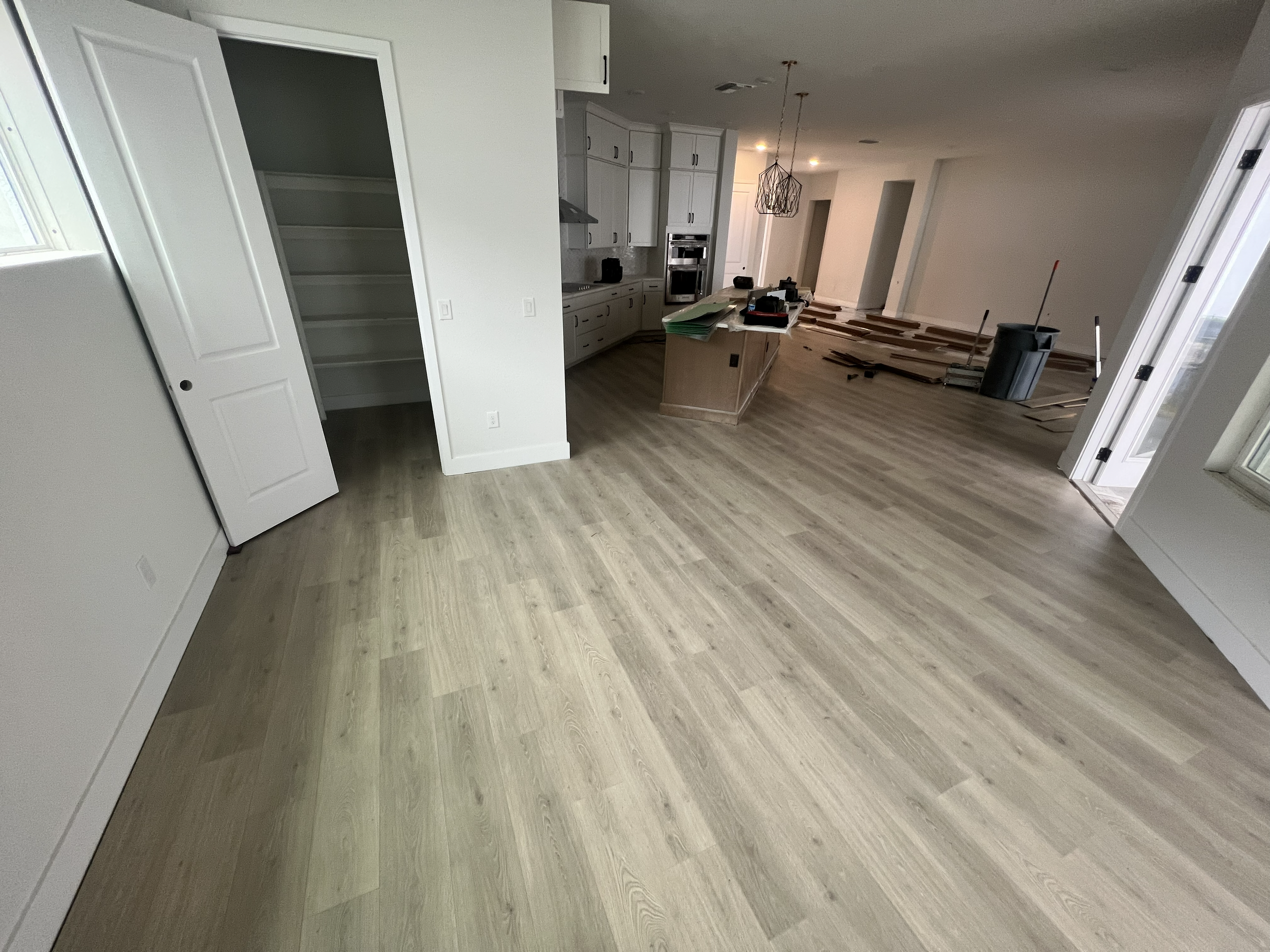 Full House, North Brandon · 2,250 sq ft Laminate + 720 lin ft Quarter Round