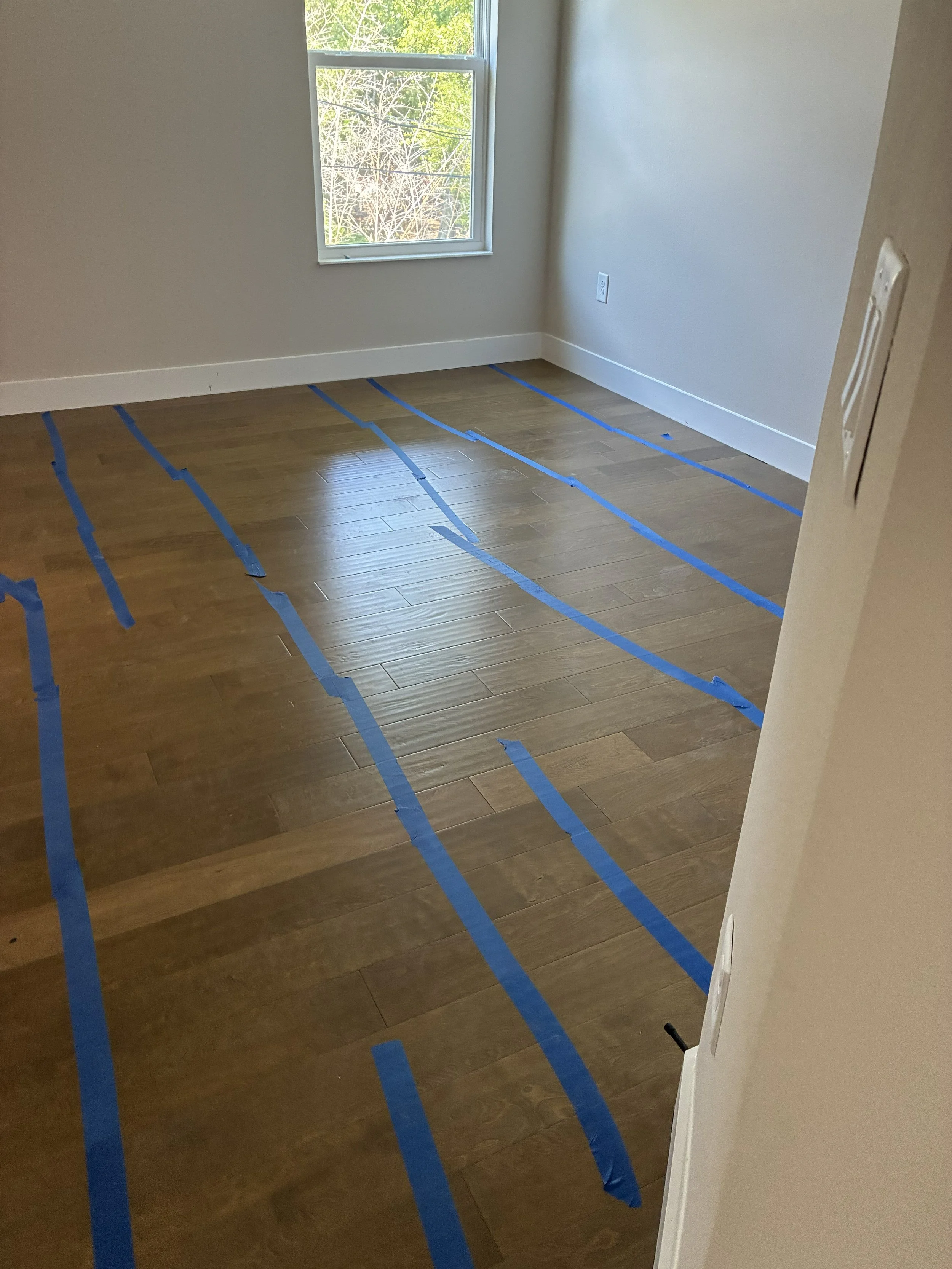 Luxury Vinyl Plank (LVP) — 100% waterproof, ideal for kitchens, bathrooms, and full home installations in South Tampa's humid environment.