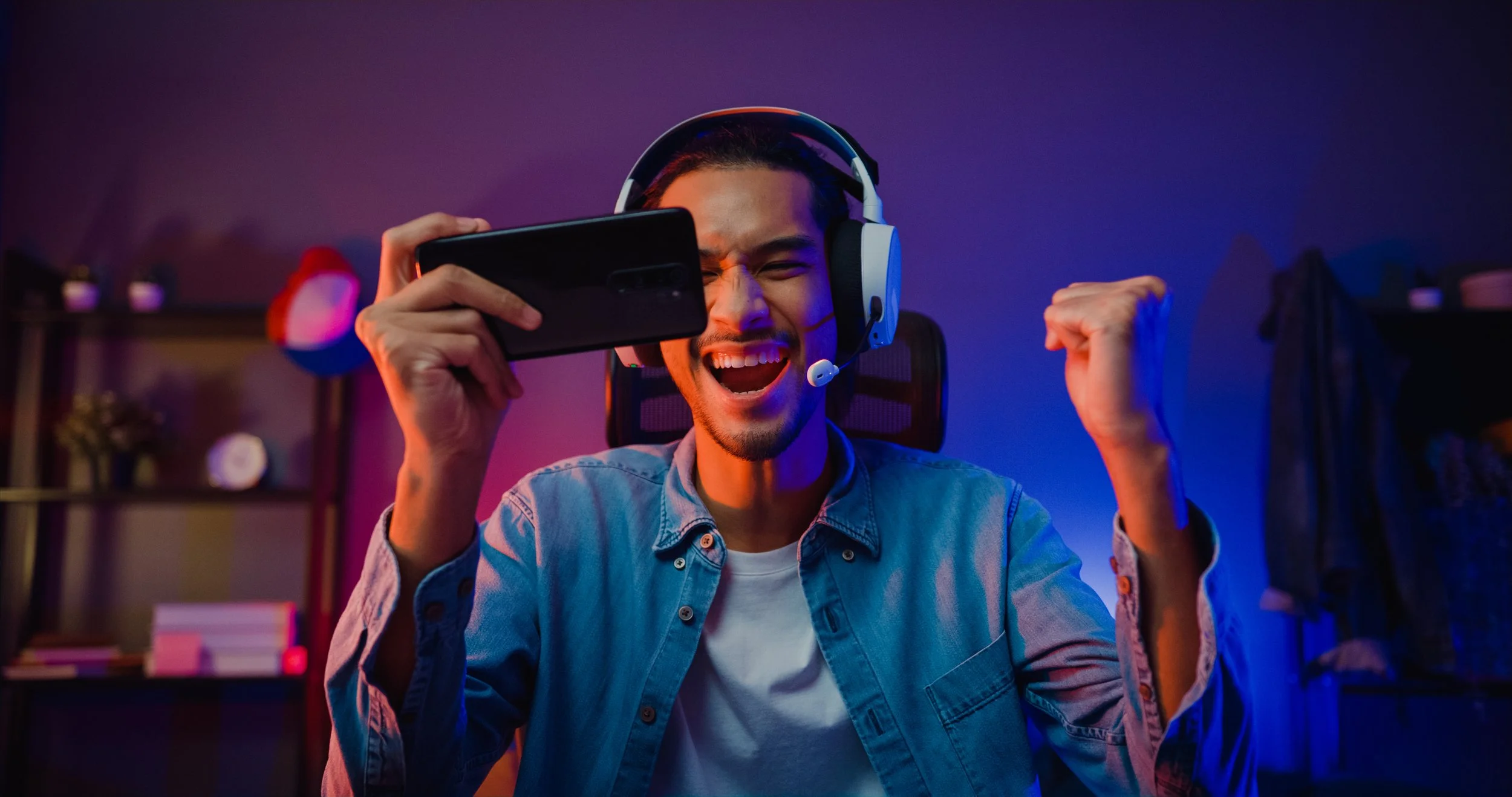 Man enjoying gaming on smartphone