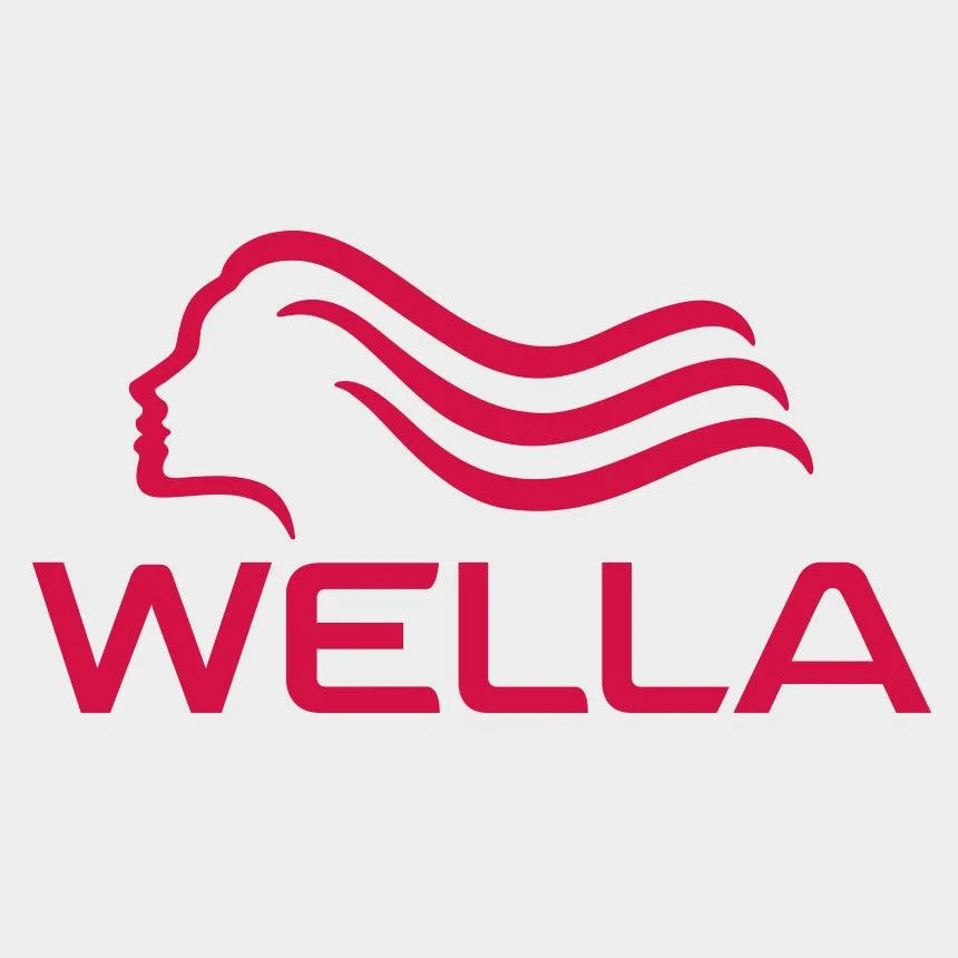 Wella-Logo mit stilisiertem Frauenkopf und welligem Haar, darunter "WELLA" in Großbuchstaben.