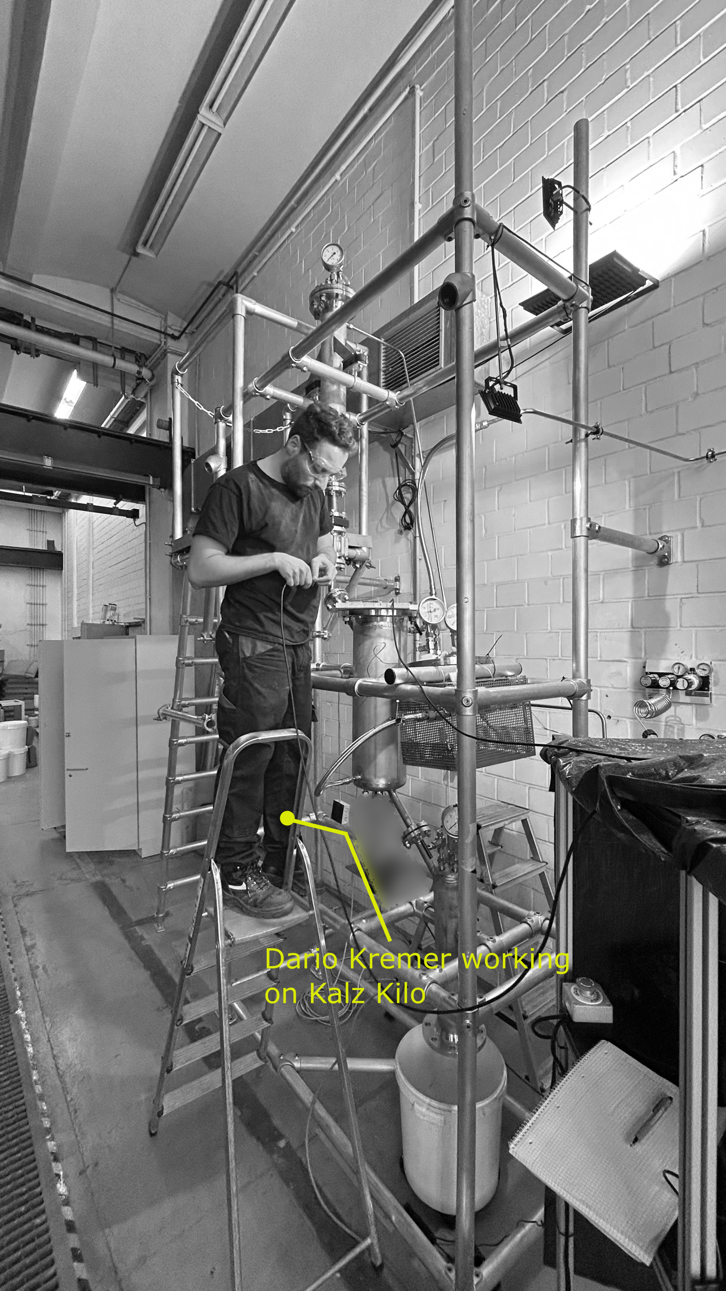 Man working on a test setup Kalz Kilo (TRL5). CCCUS , CO2 mineralisation plant.