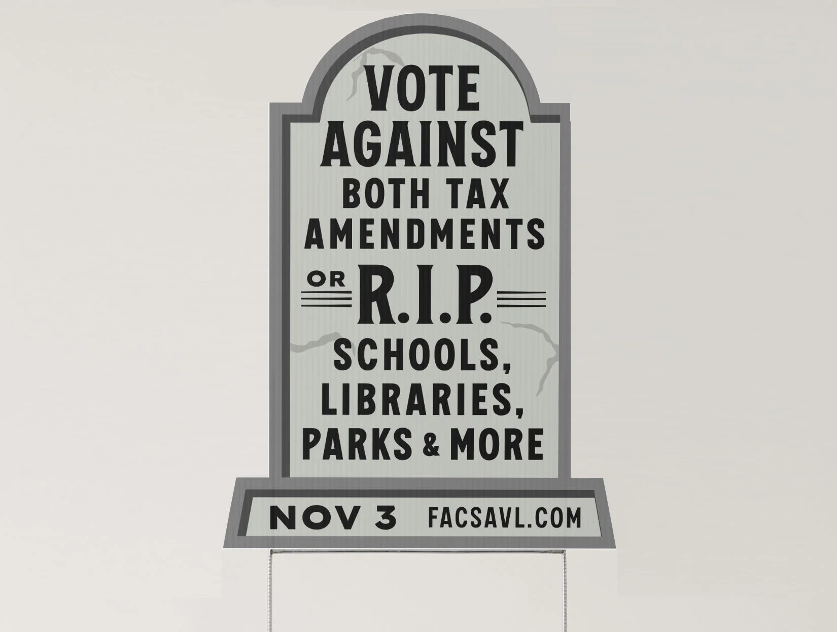A protest sign with the message 'Vote Against Both Tax Amendments or R.I.P. Schools, Libraries, Parks & More' for an event on November 3rd, displayed on a stand.