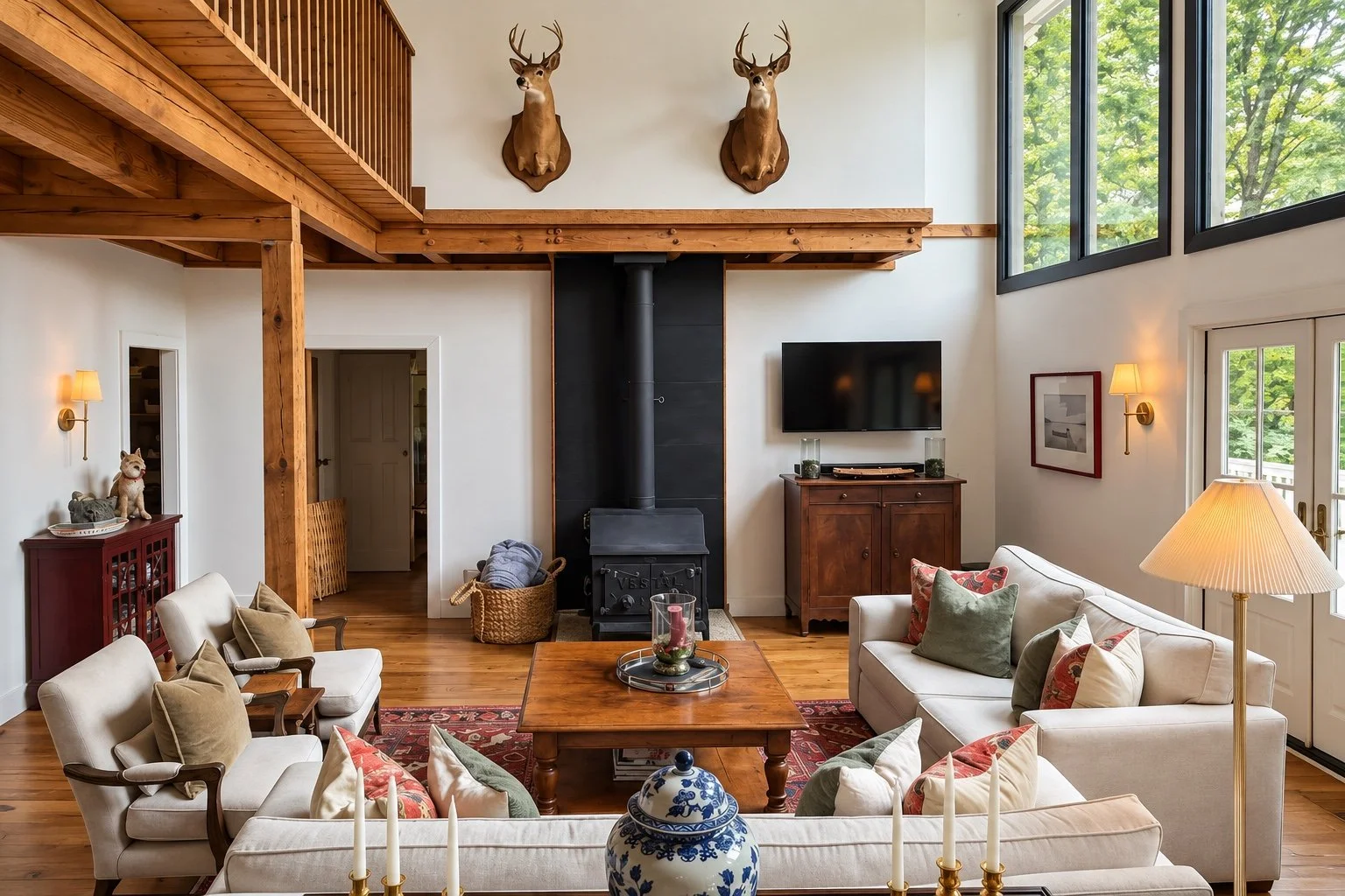 The living room and wood-burning stove at Pine Shore Lodge.