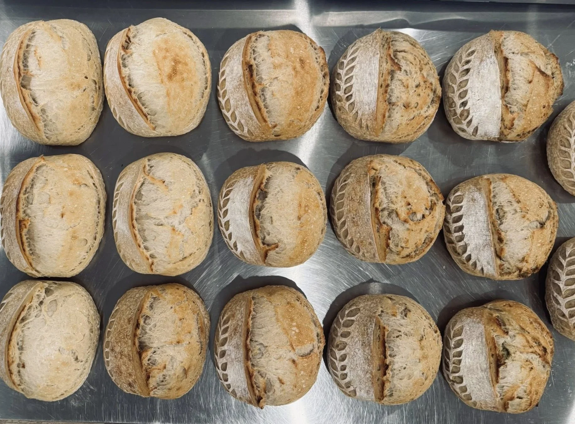 Rustic sourdough bread on wooden table