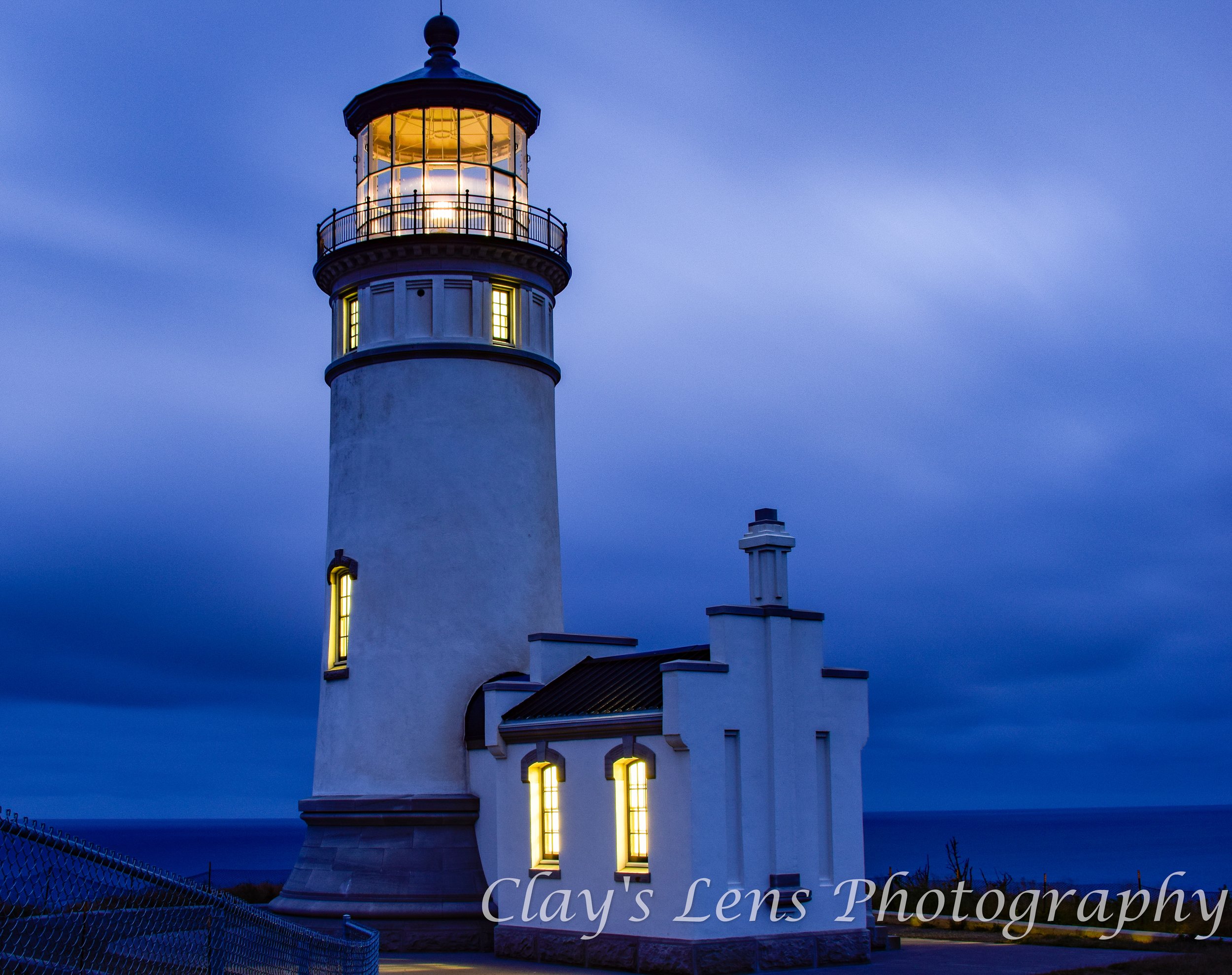 Cloudy Dawn Lighted Lighthouse WA preview .jpg