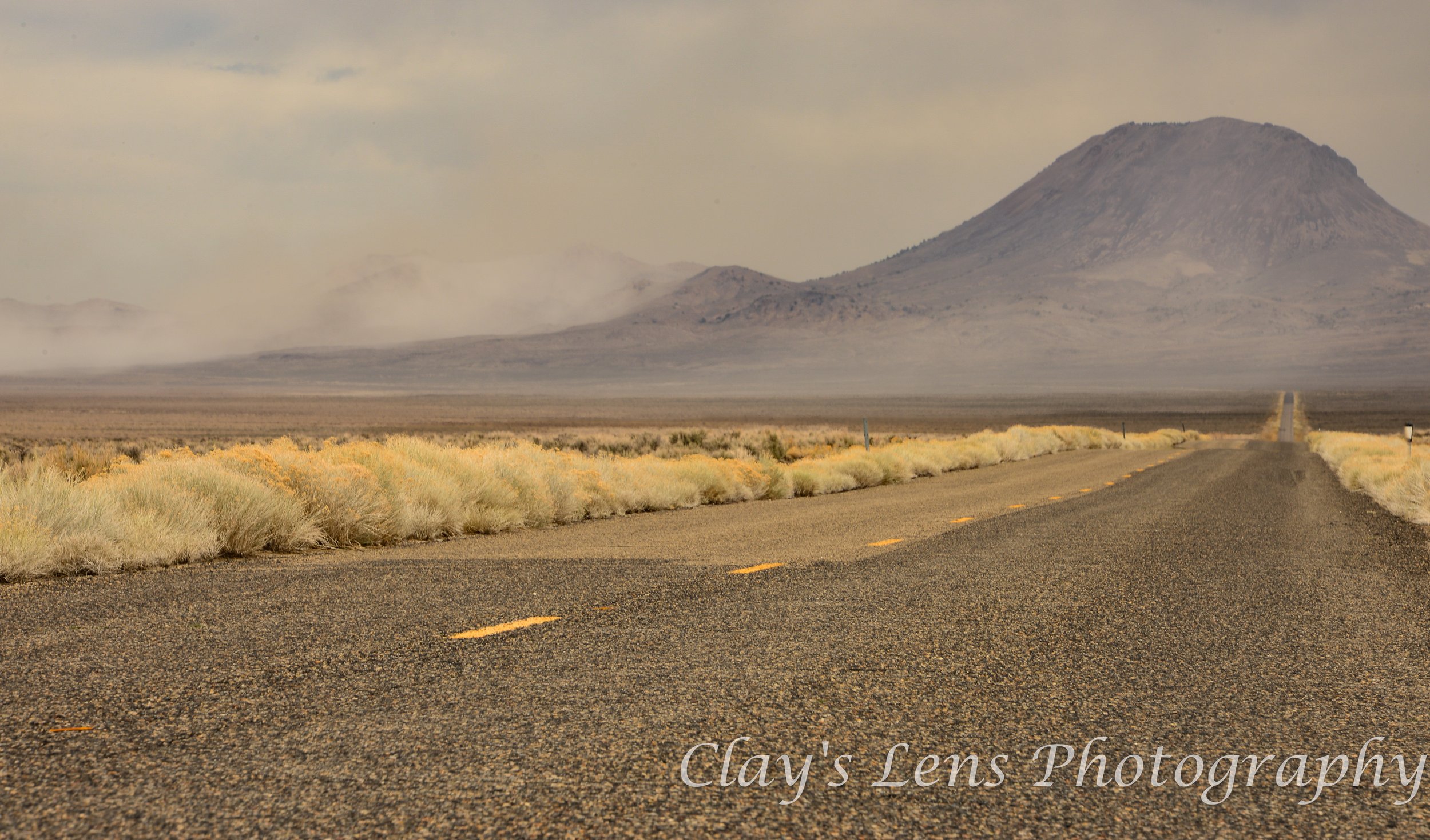 Distant Dust Storm Against Desert Mountain preview.jpg