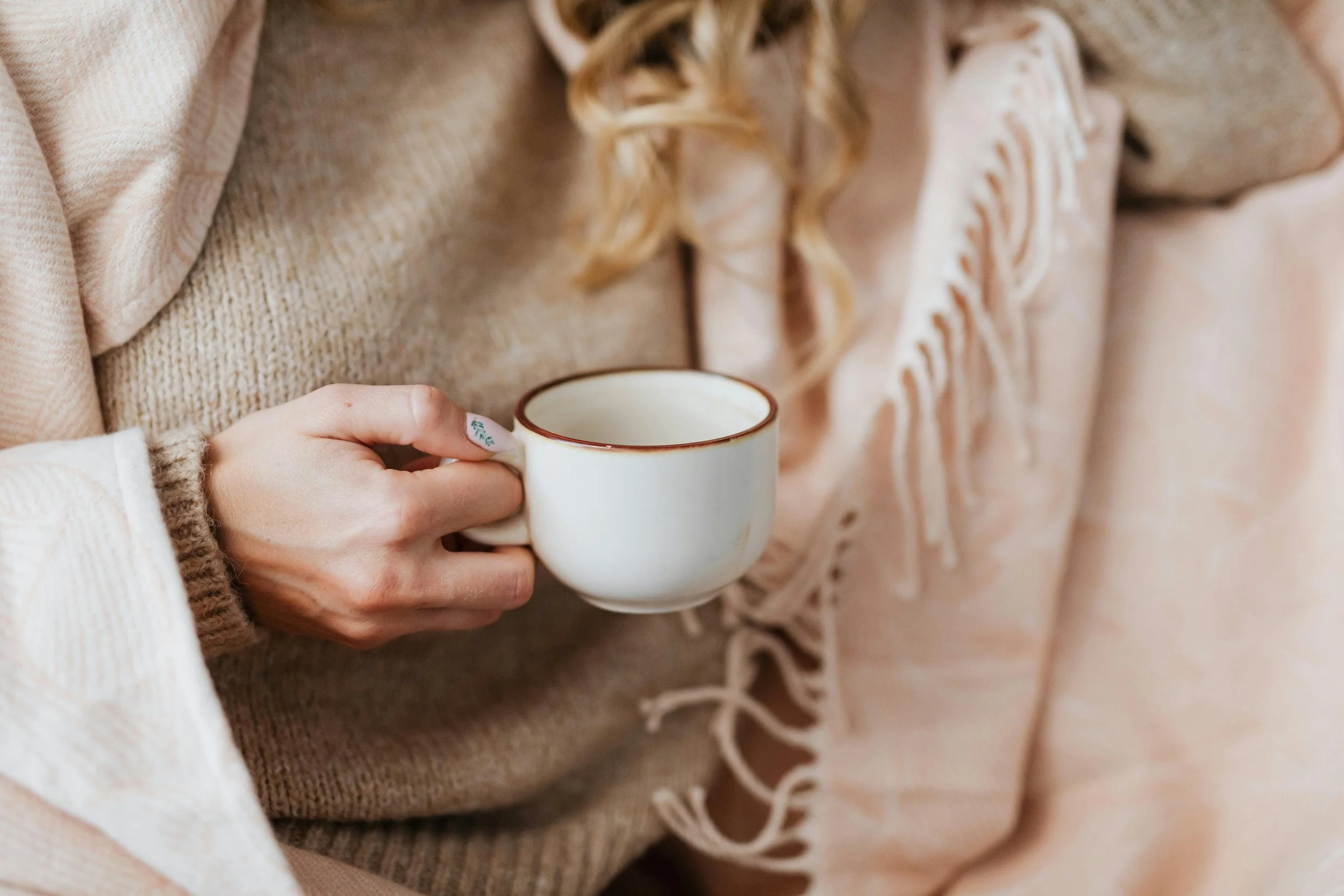 Hand with mug