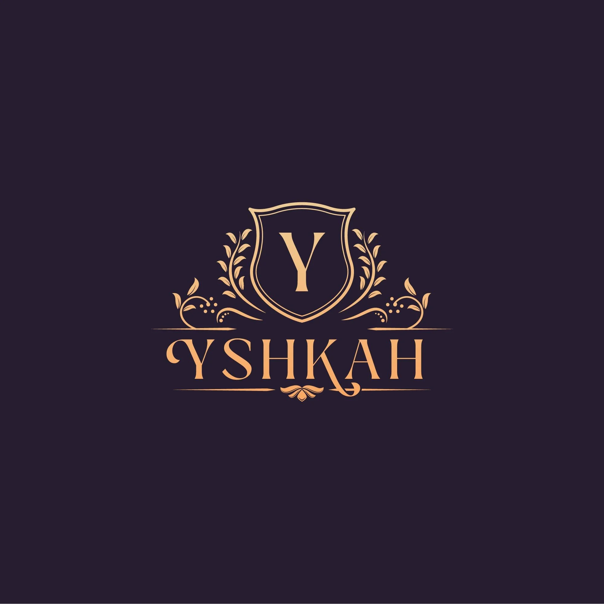 Logo avec un bouclier contenant la lettre Y, entouré de feuilles décoratives, avec le texte "YSHKAH" en dessous dans un style élégant