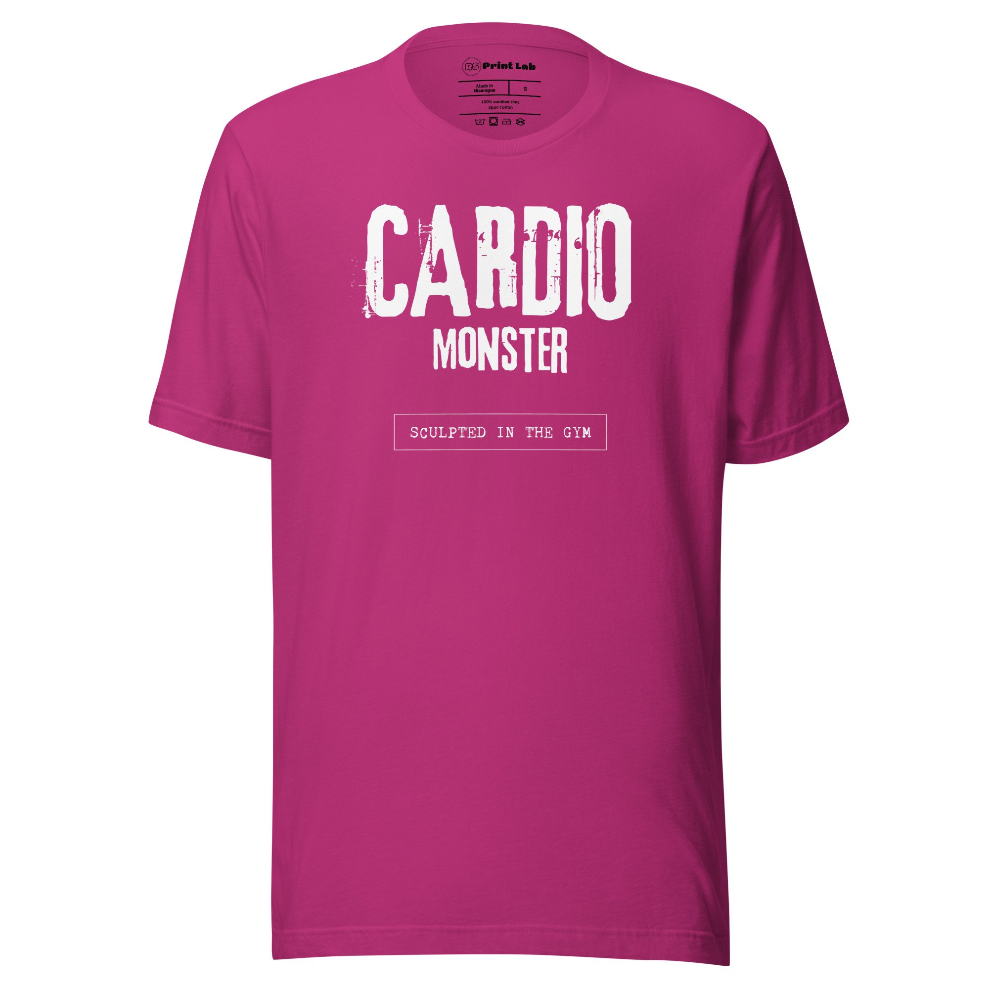 Pink T-shirt with the words 'CARRY ON' displayed in bold, distressed white text, and the word 'MONSTER' underneath, with a smaller line of text reading 'SCULPTED IN THE GYM' at the bottom.