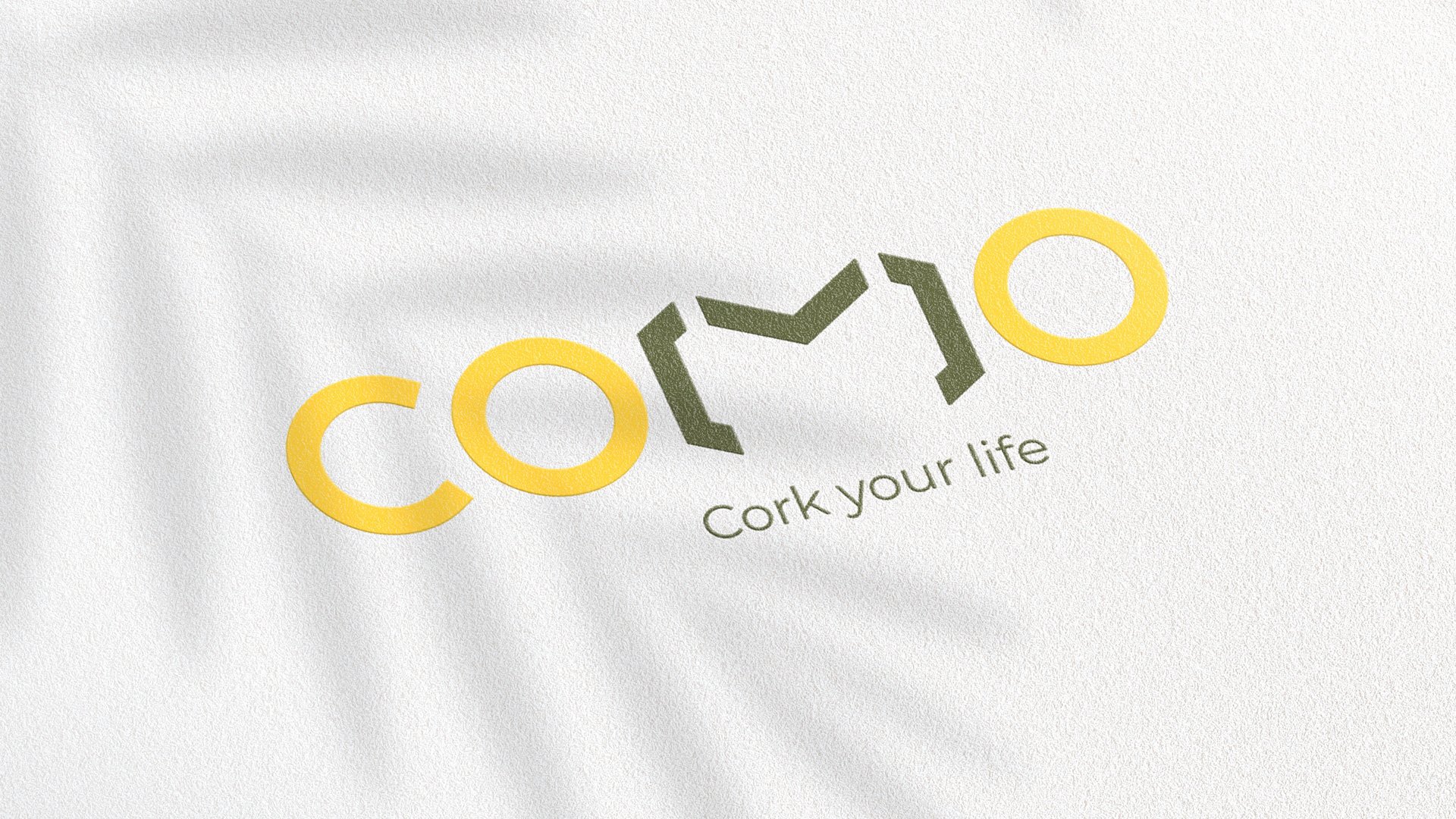 Logo with text 'COMO' in yellow and green, with tagline 'Cork your life' on a textured white background.