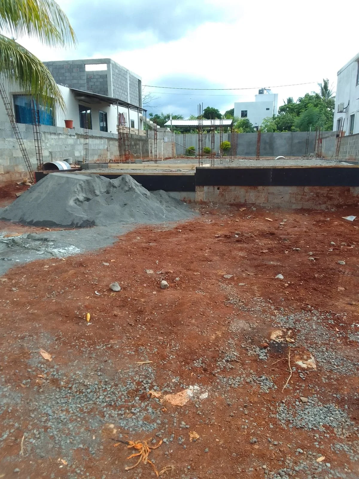 Photograph of plot of land after site clearance, for building a new home, Terre Rouge, Mauritius.