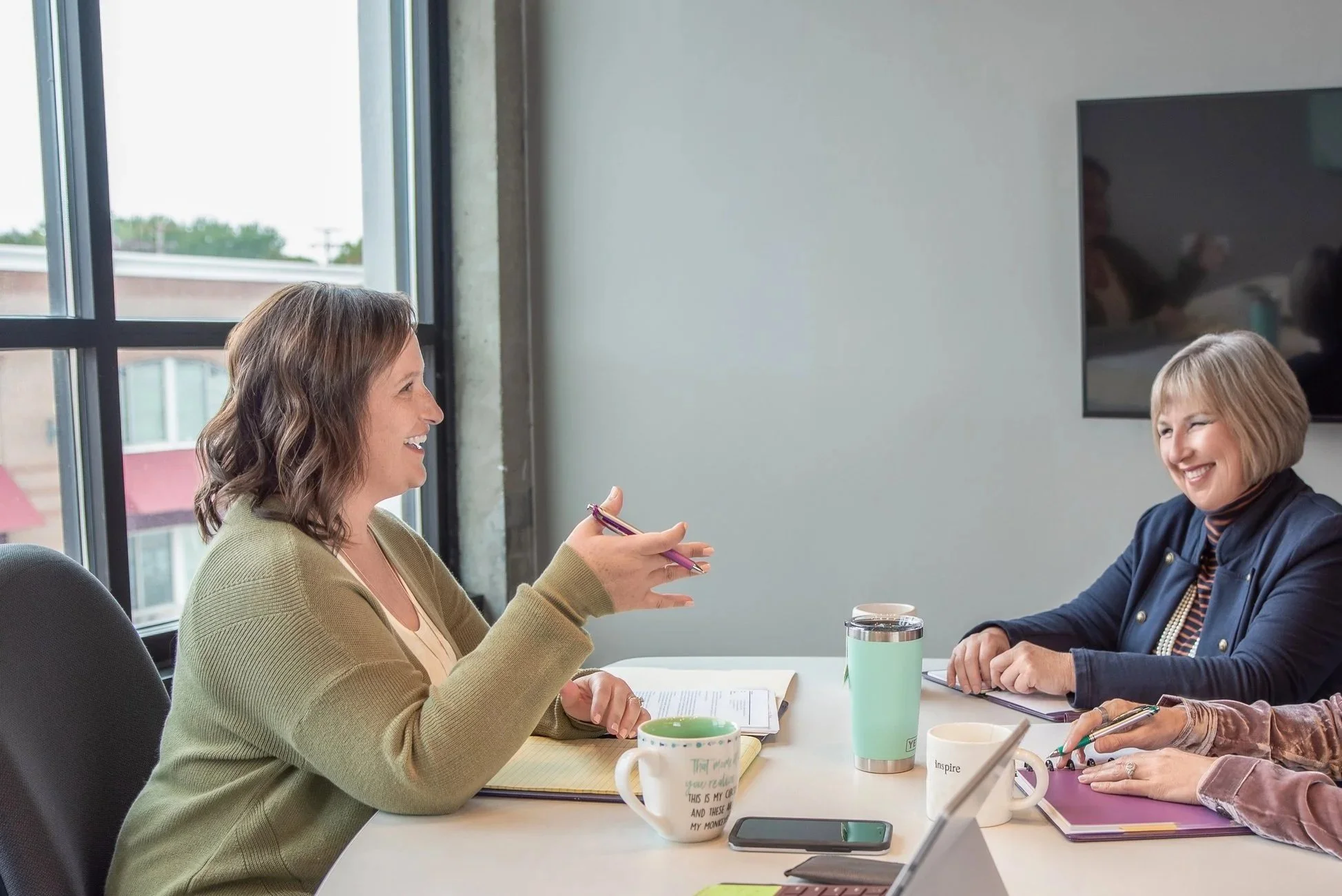 Mandy Nycz facilitating a coaching session with clients.