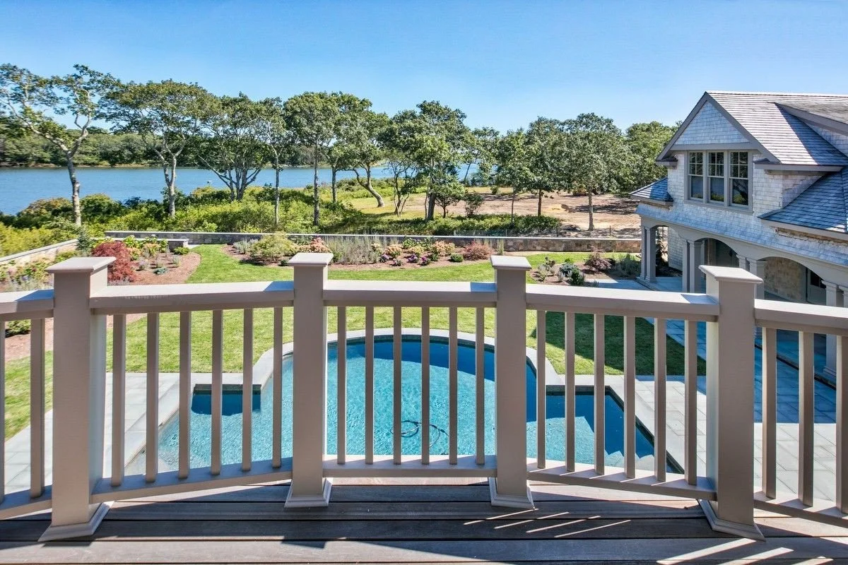 bedroom balcony view of pool.jpeg
