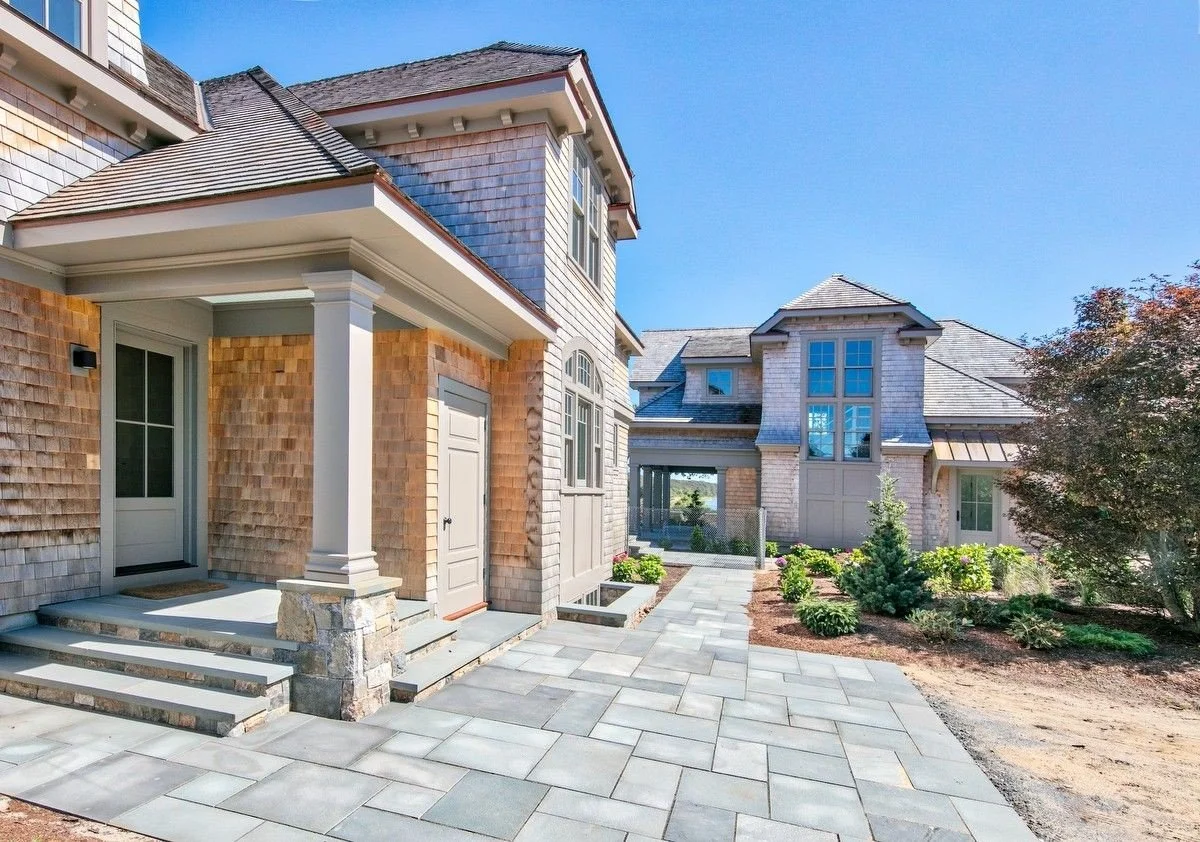 mudroom entrance with pool house beyond.jpeg
