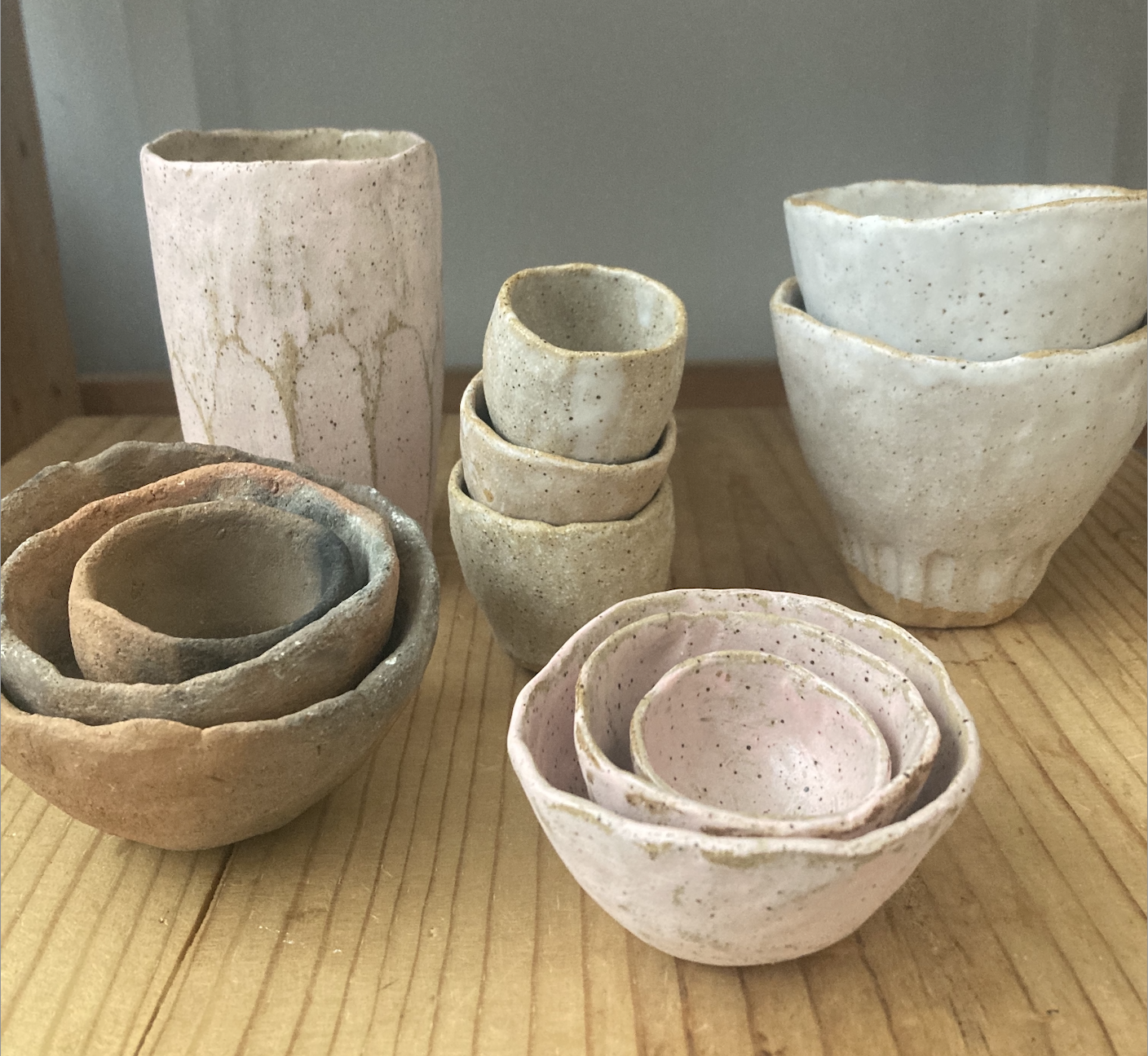 Various hand-built ceramics, wild clay and traditional clay forms and vessels.  