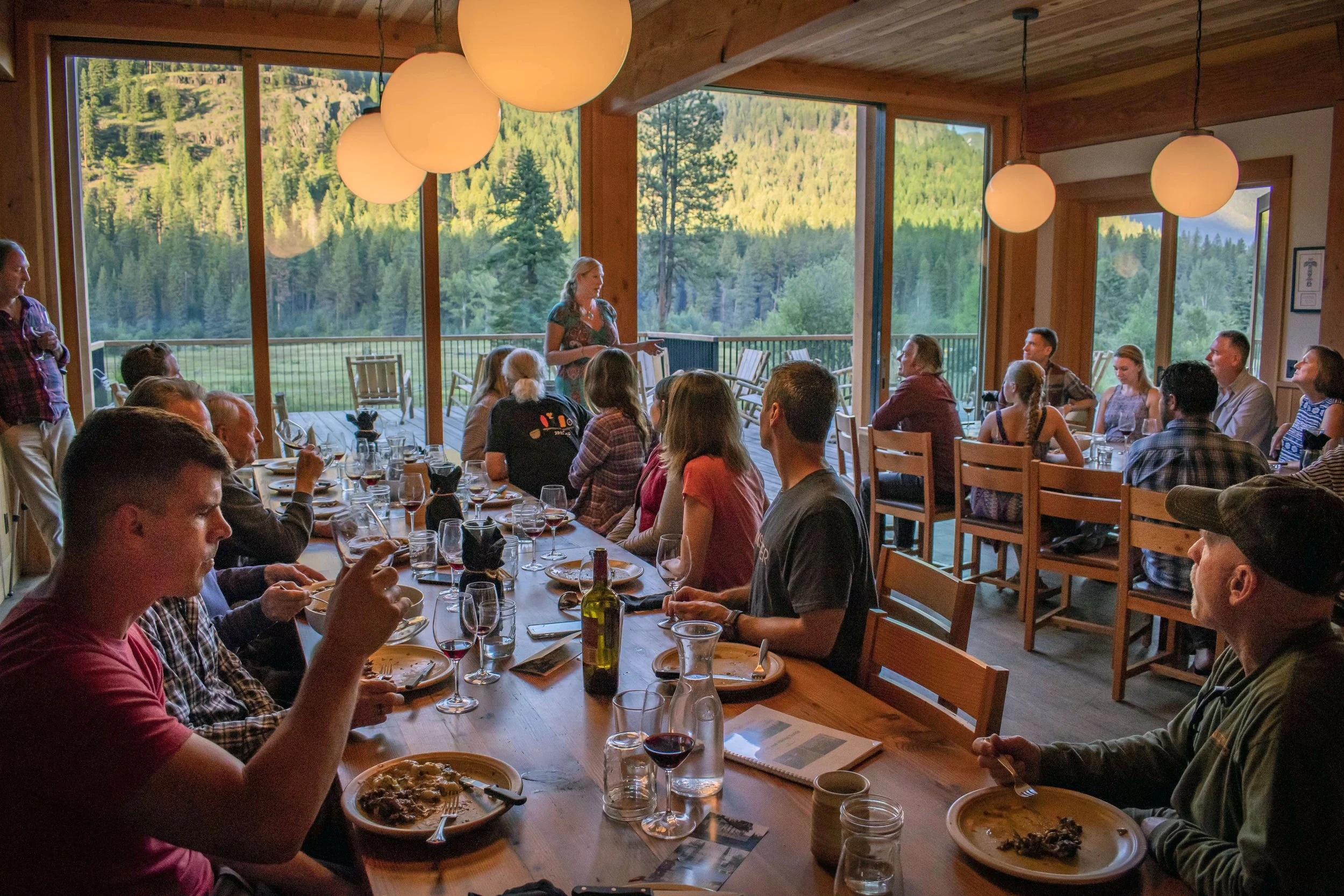 Minam_Lodge-Indoors_Britta explains wine.jpg