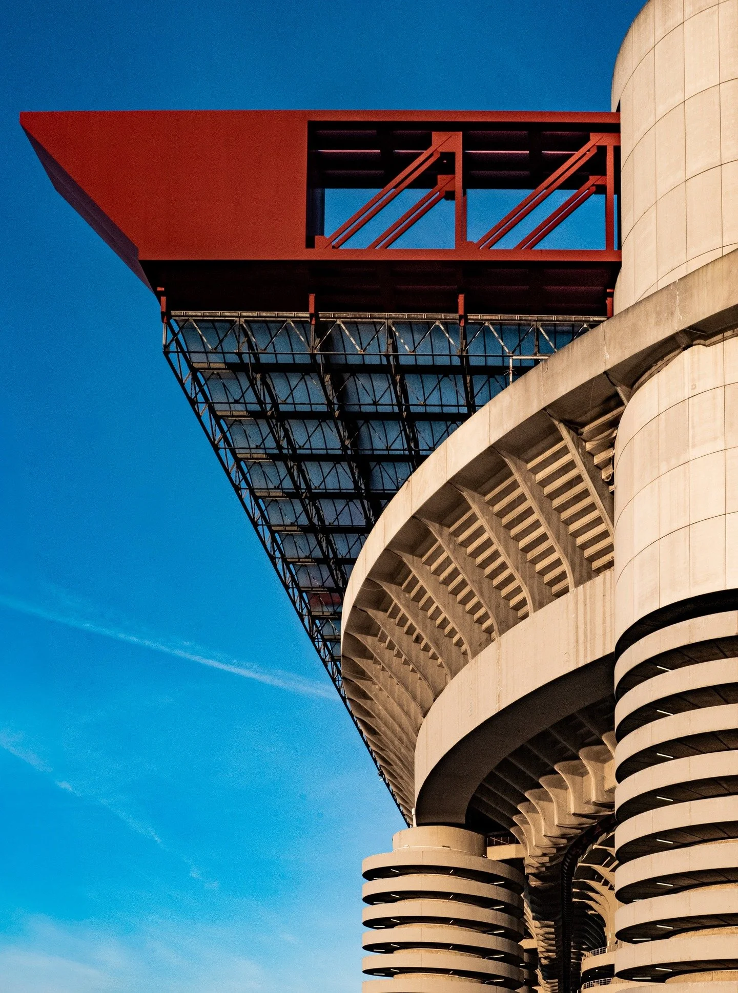 San Siro; captured and framed during a recent trip to Milan.

San Siro&rsquo;s external ramps unfold like a concrete choreography &mdash; layers of spirals intersecting, overlapping, and repeating. The complexity isn&rsquo;t decorative; it&rsquo;s ex