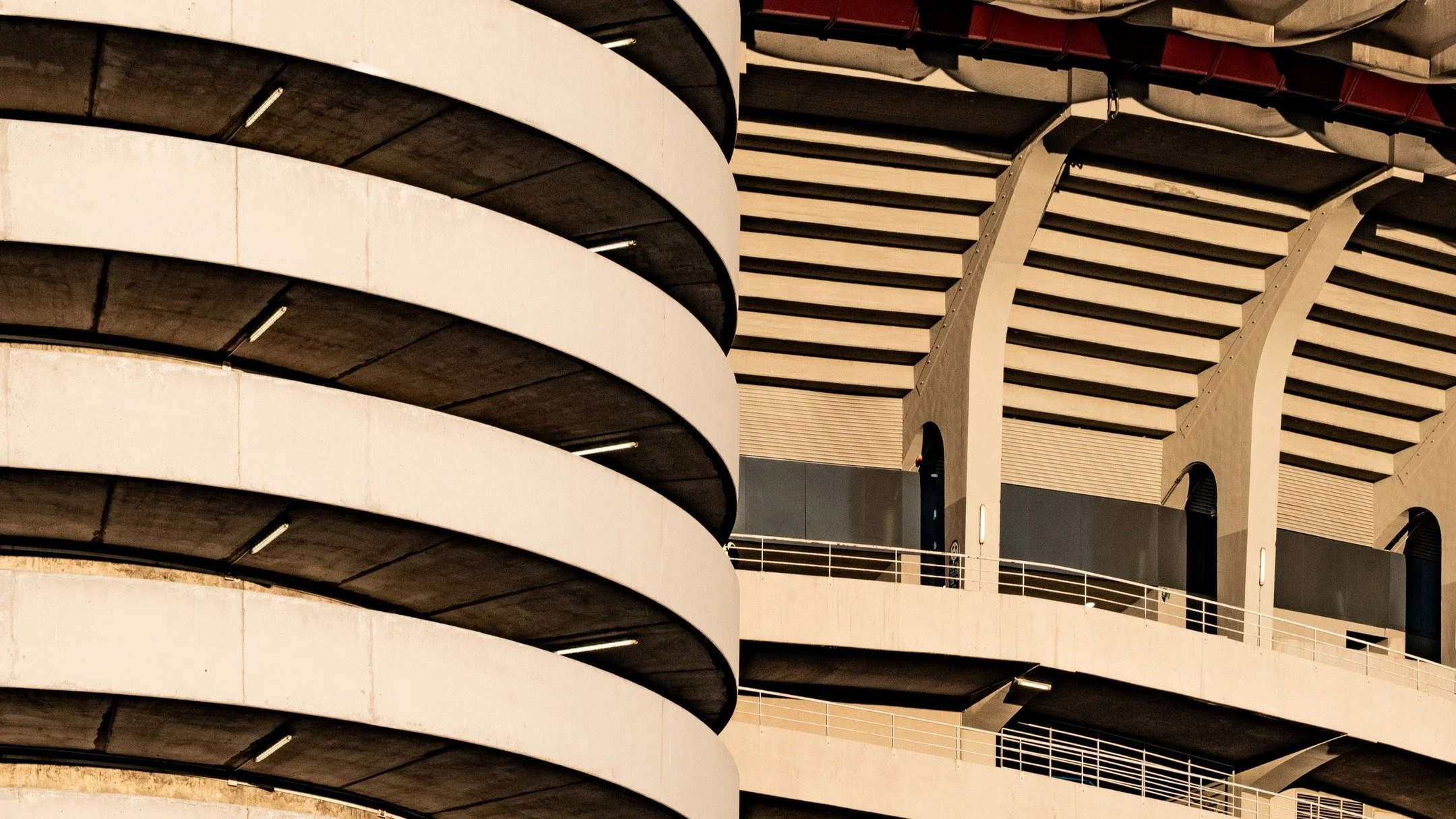 Architecture built for motion.

A recent trip to Milan led me to the outer layers of San Siro, where circulation defines the architecture.

San Siro&rsquo;s external ramps unfold like a concrete choreography &mdash; layers of spirals intersecting, ov