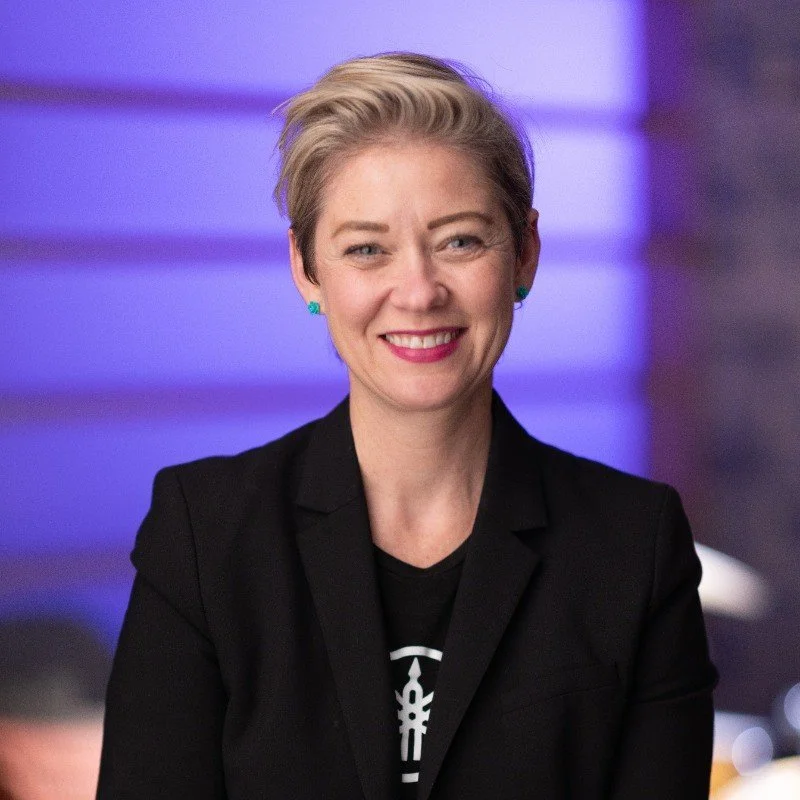 Placeholder silhouette of a person on a light gray background.