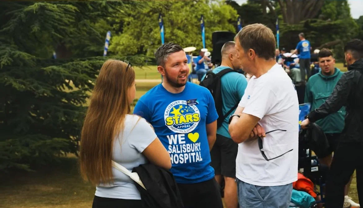Adam Abel speaking at Stars Appeal Walk for Wards with another Patient Ambassador.