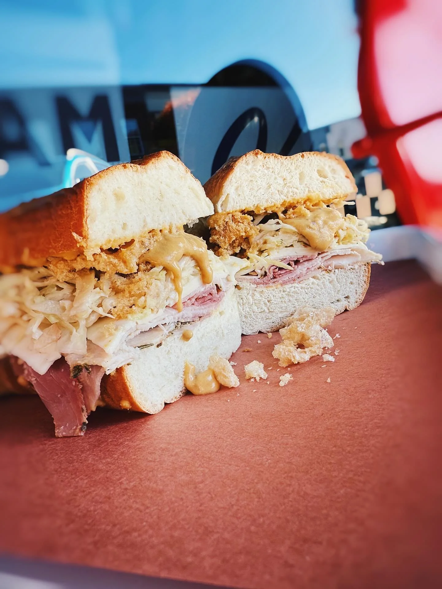The Gilded Pig. Rosemary ham, sweet potato mustard, havarti, apple slaw, pork rind. 🔥 quickly becoming the staff favorite. Have you tried it yet?