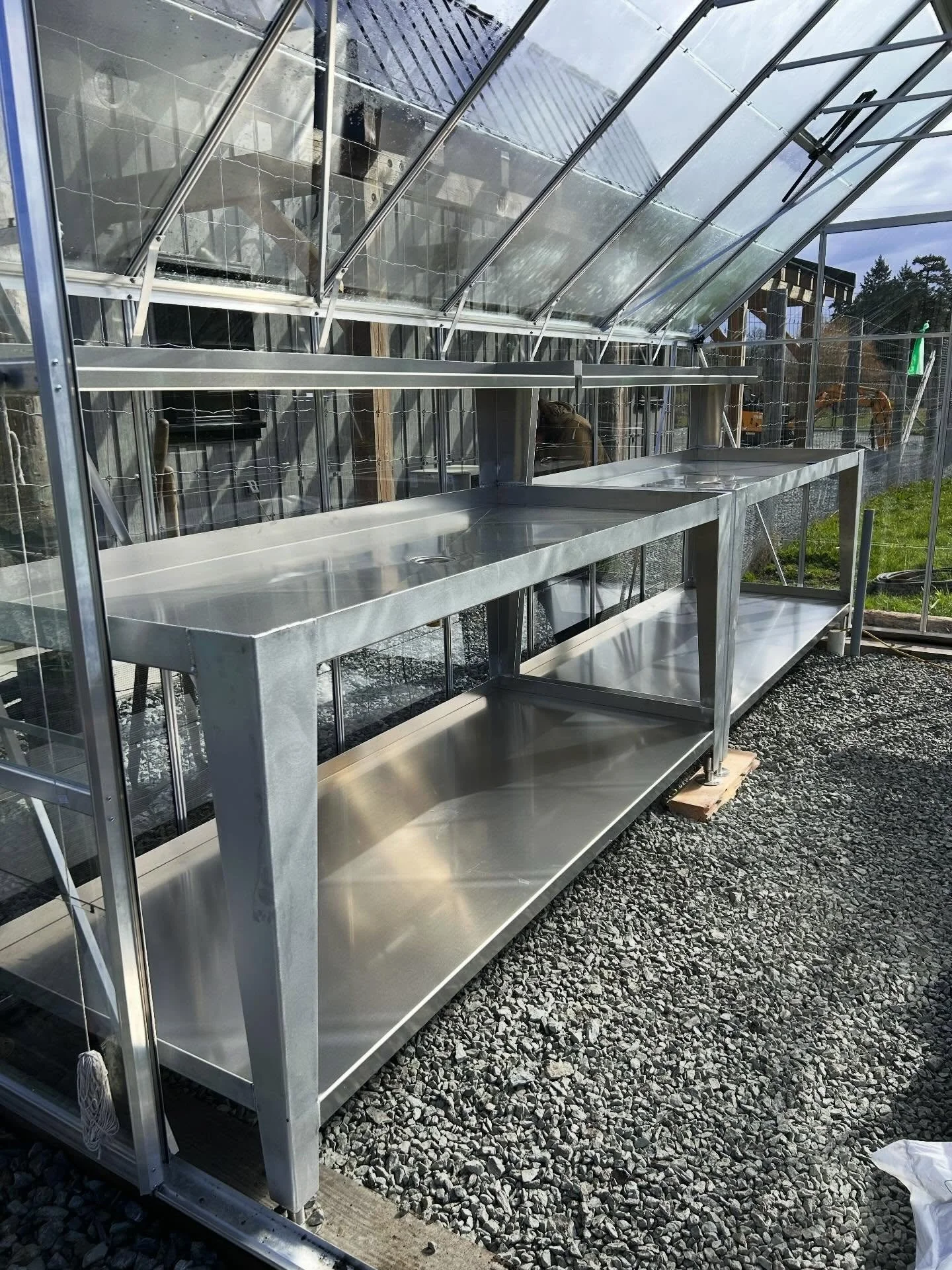 After @jbsheetmetalltd shared our custom flood tables at their shop, we wanted to show them in action! 🌱 We are a low-plastic farm, and these tables allow us to efficiently bottom water trays of soil cubes. This means the only plastic we&rsquo;re us