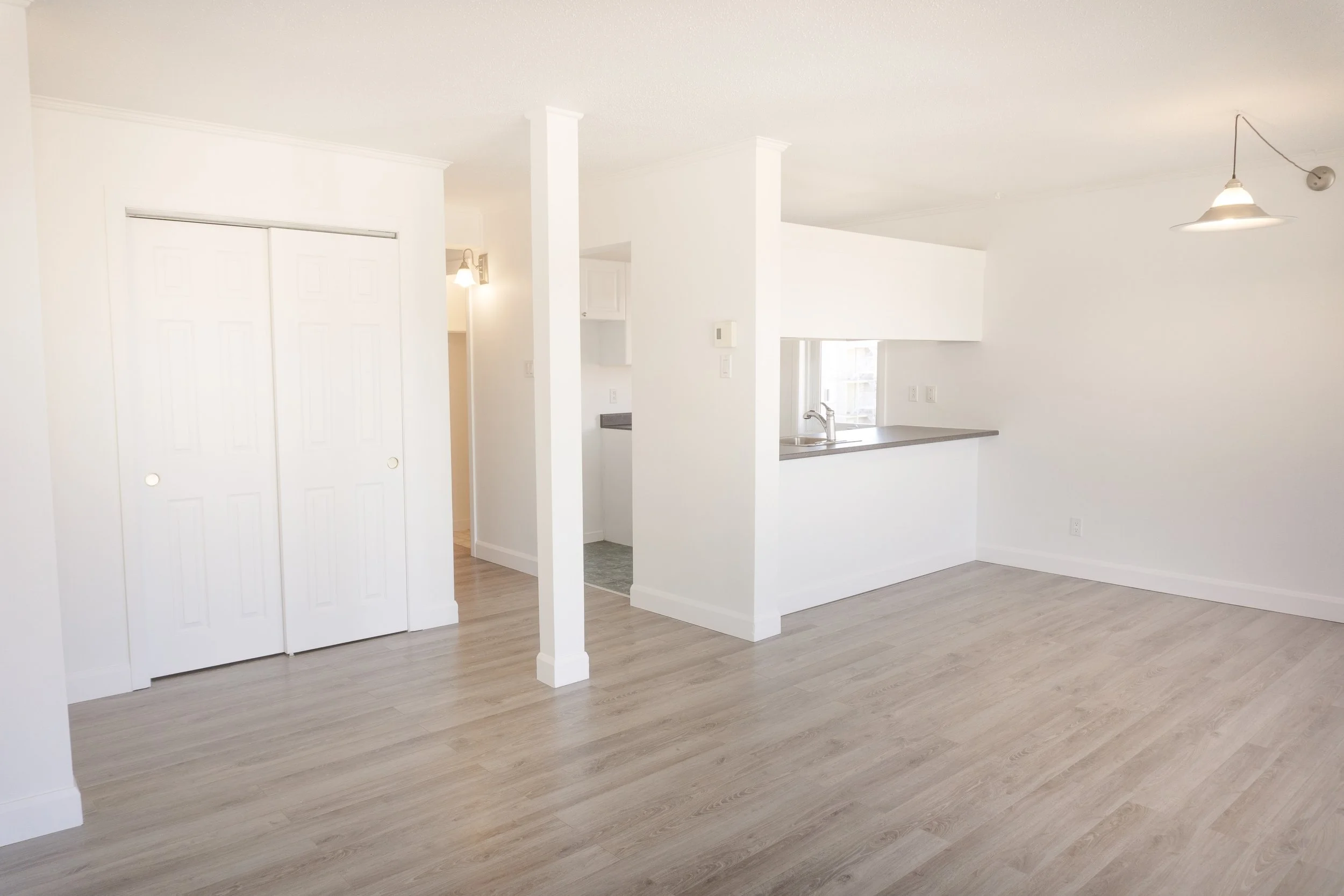 Photo immobilière; salon et salle à manger d'un appartement à Québec