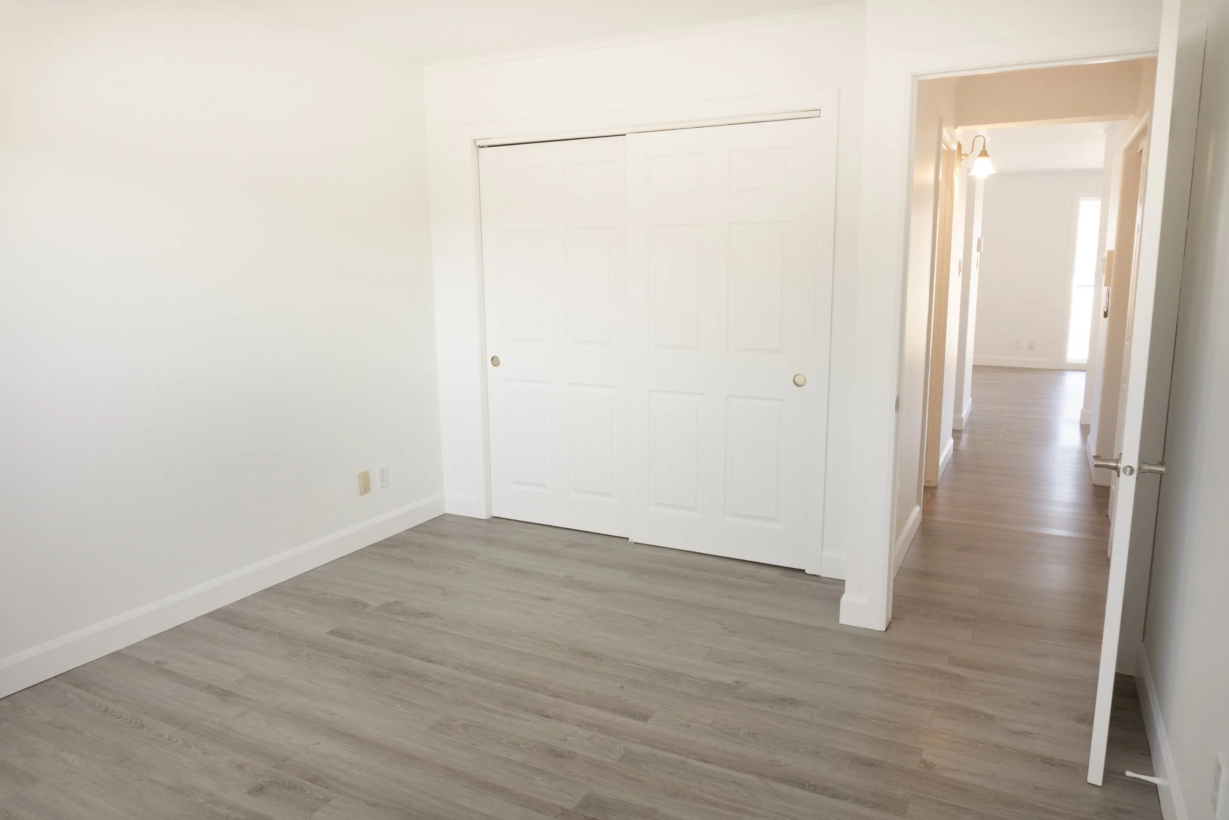 Photo immobilière; grande chambre d'un appartement à Québec