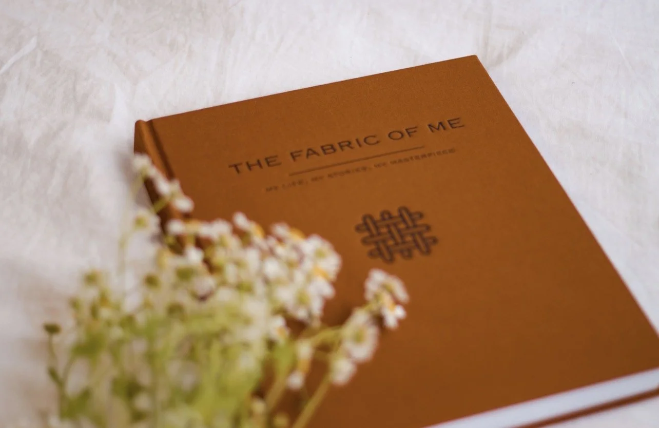 book diagonal bed with small daisies.jpg