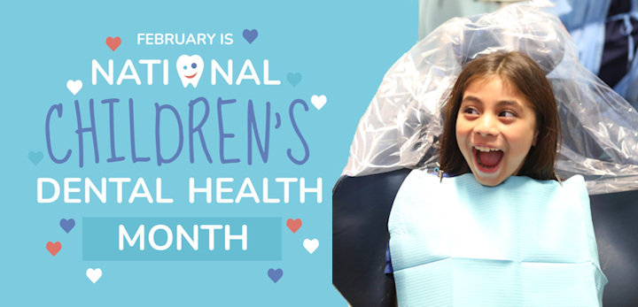 Happy girl visiting the dentist