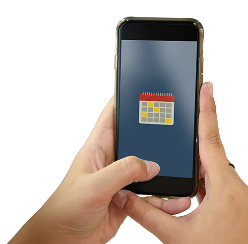 Person holding a smartphone displaying a calendar app icon.