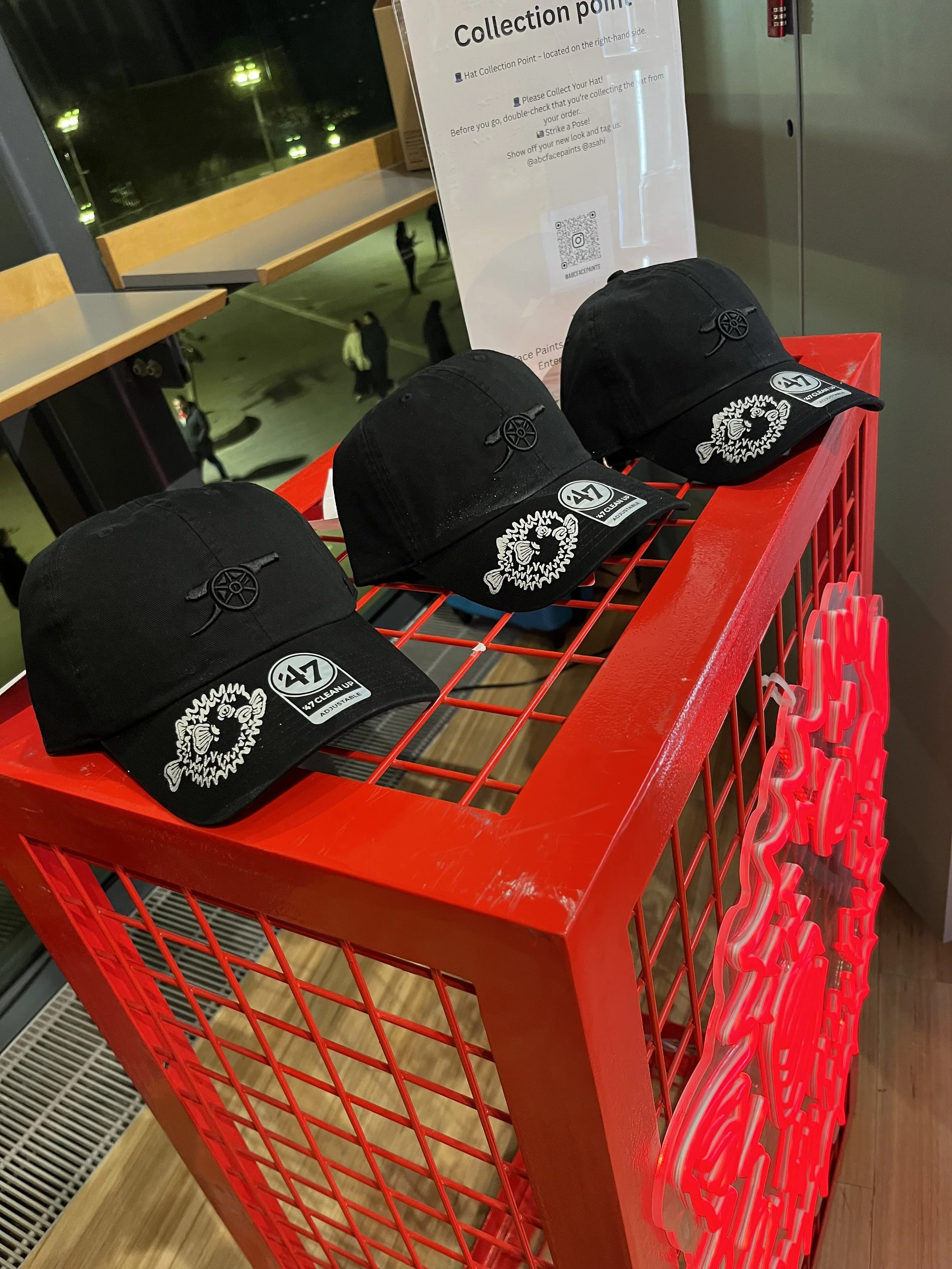 "Custom airbrushed T‑shirt design being created at event in London"