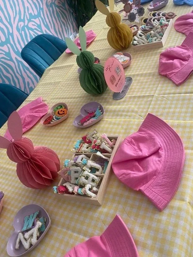 Children enjoying colourful craft activities at a corporate party