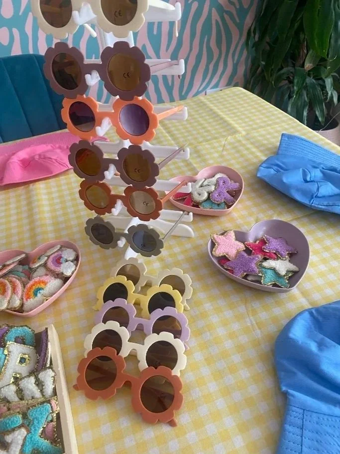 "Creative craft area set up with supplies for party and corporate event personalisation activities"
