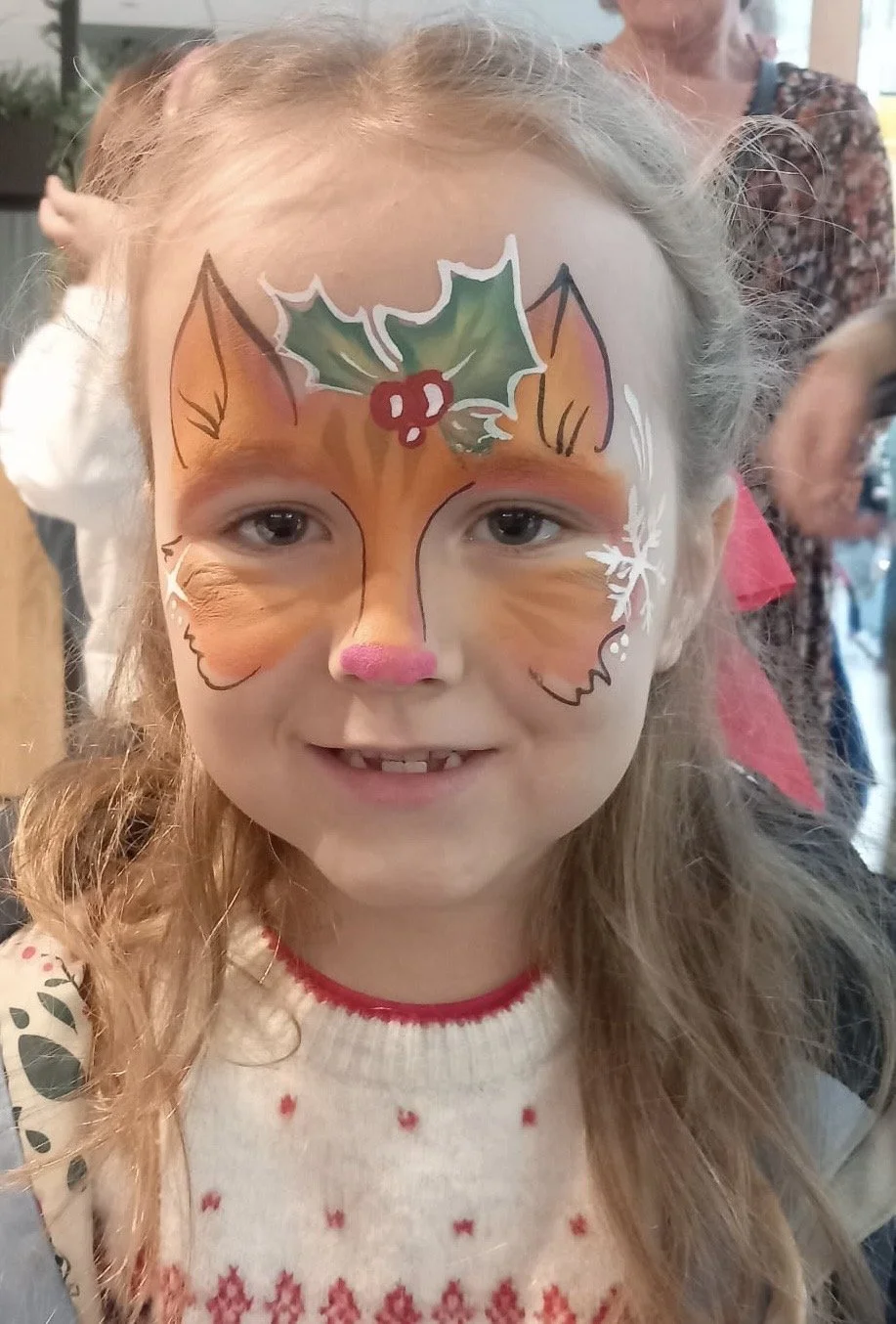Face painting for children at a birthday party in Sutton, South London