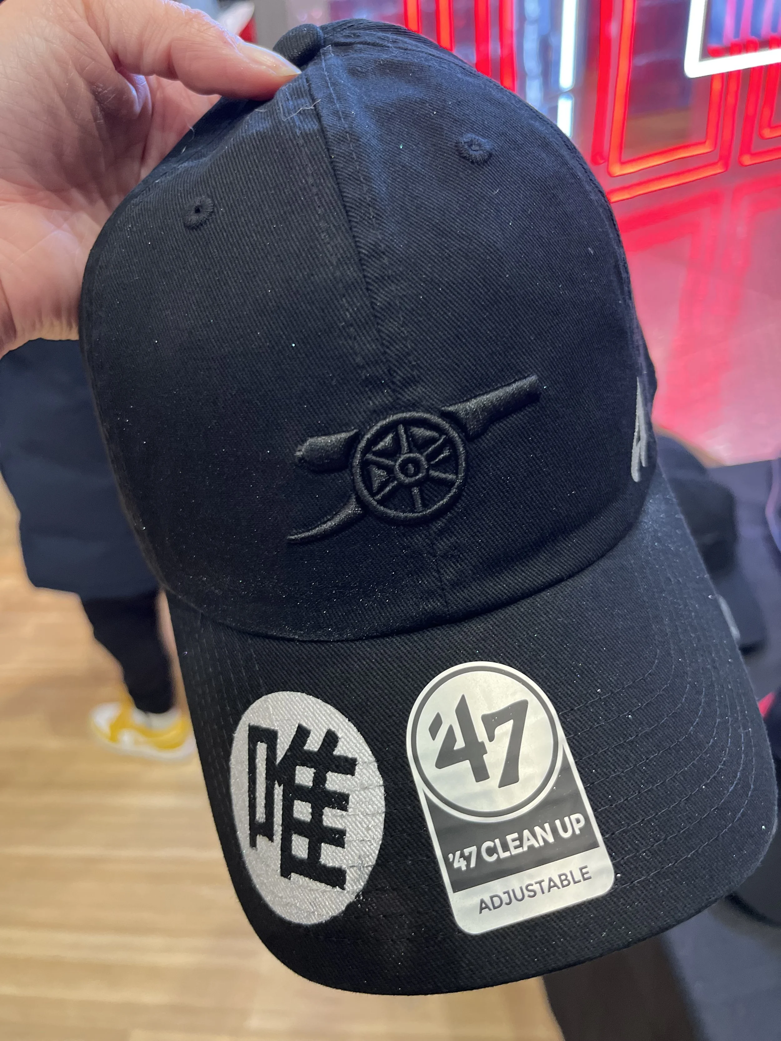 "Artist creating live airbrushed apparel at London brand activation"