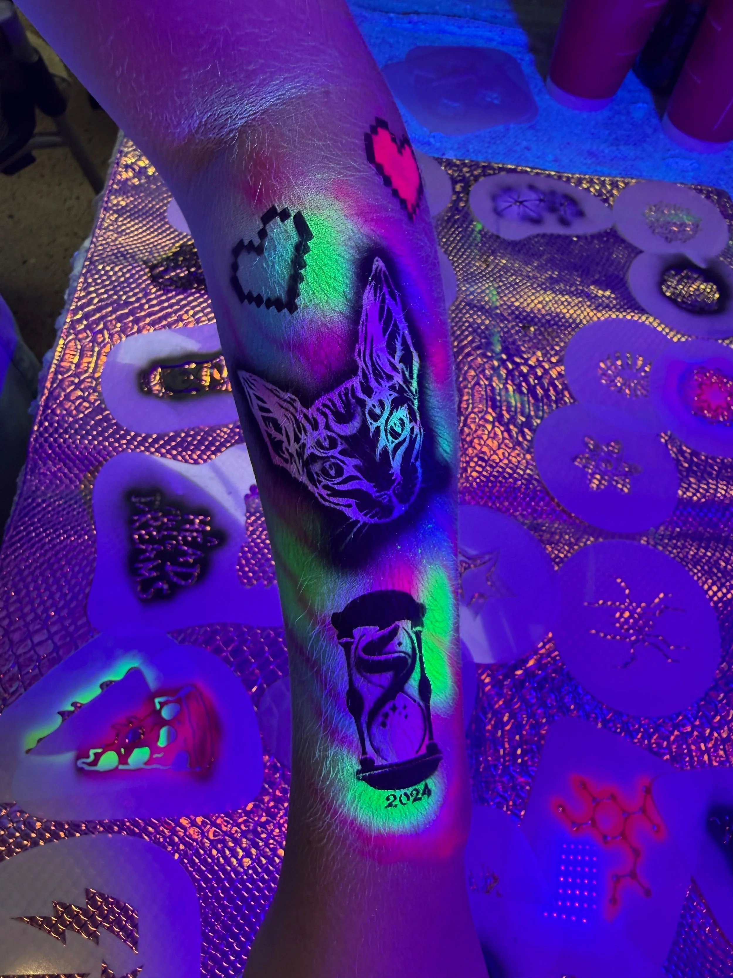 Interactive airbrush body art experience for guests at an event