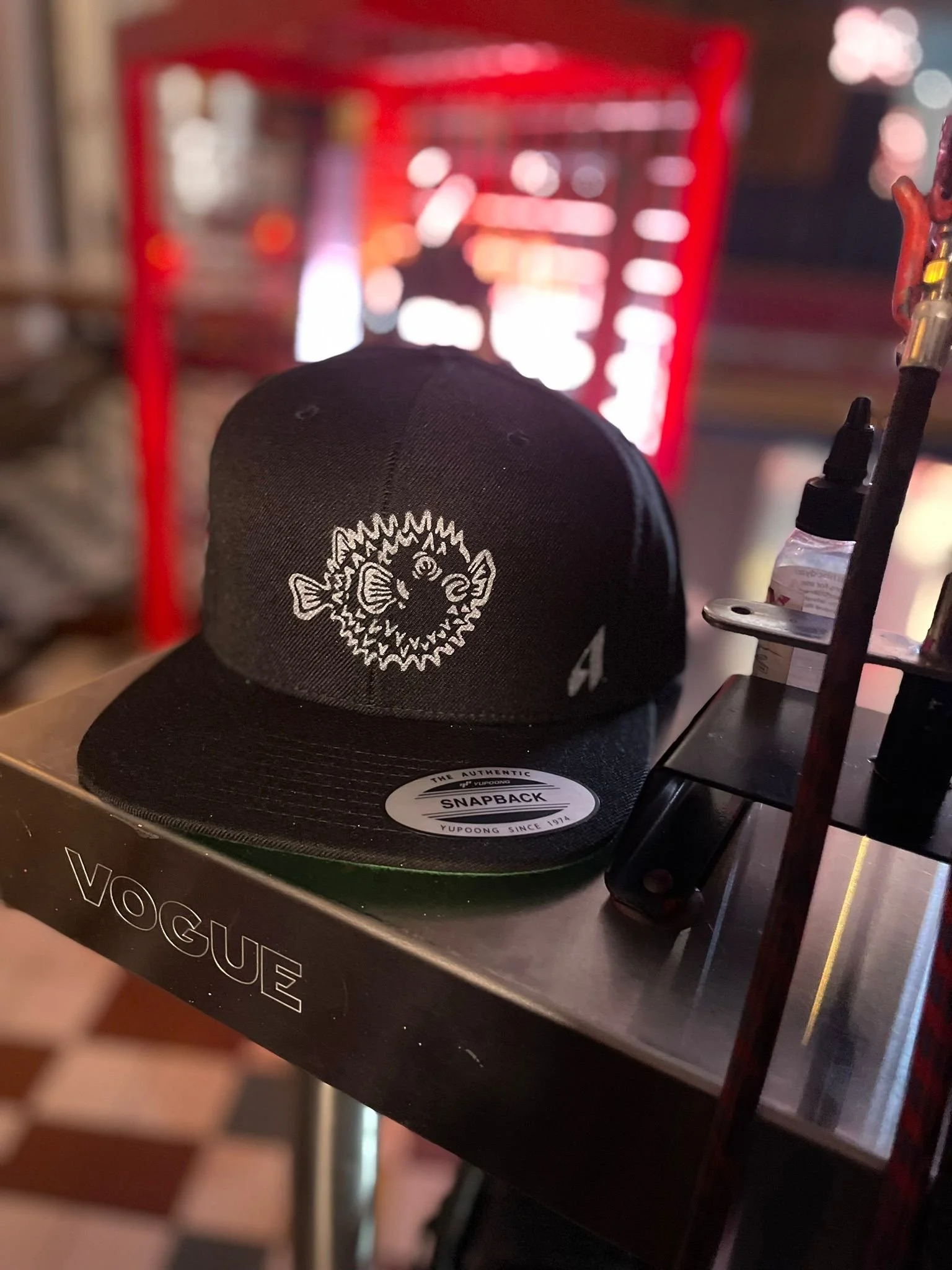 "Artist airbrushing apparel during PR event in Westminster London"