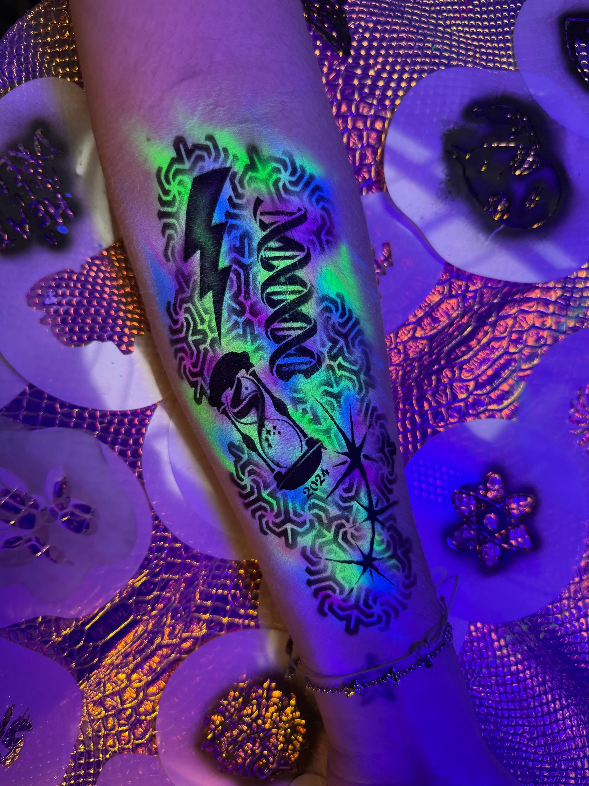 Airbrush tattoo station at a festival-style event
