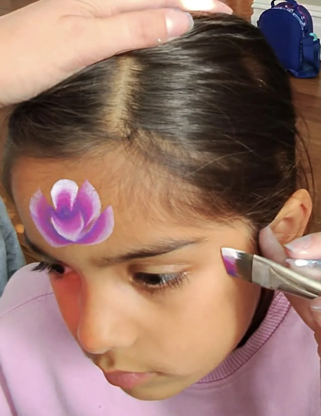 Face painting for children at a birthday party in Wimbledon, South West London
