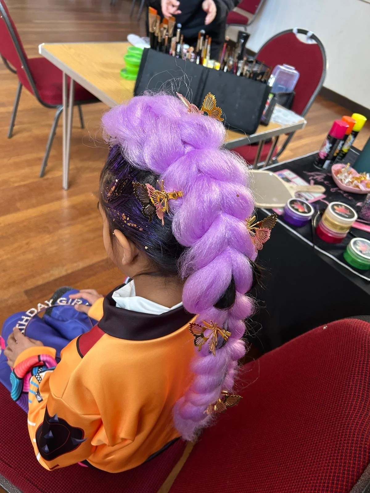 "Kids’ party hair styling setup at a luxury event in Mayfair, London."

