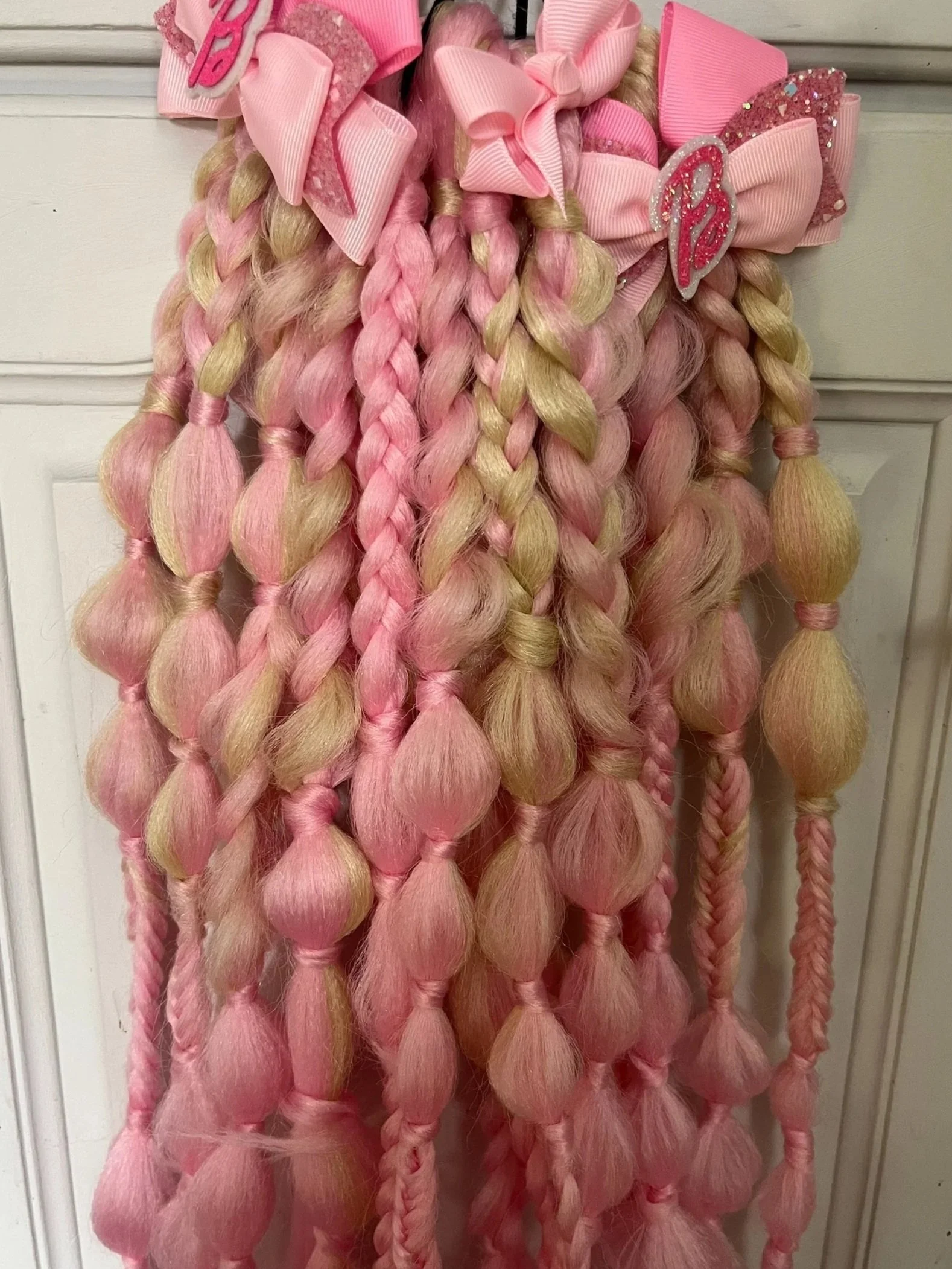 “K‑pop braid hairstyle for child in Wimbledon”