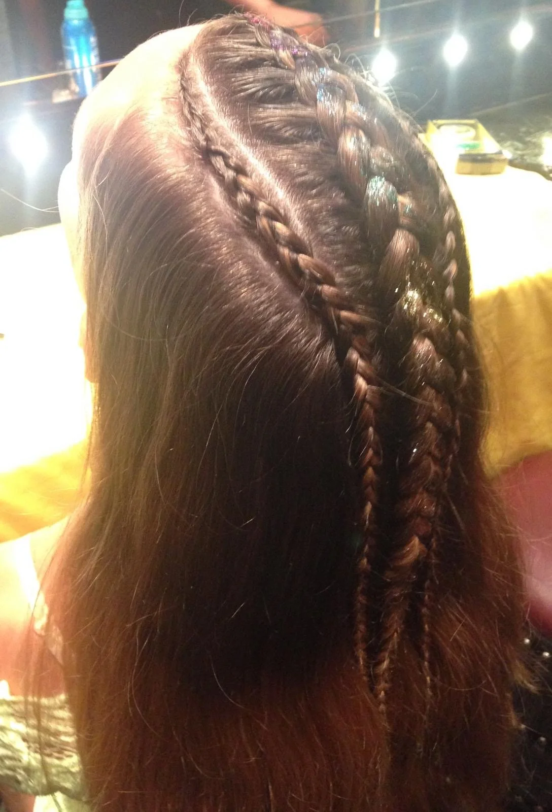 Adults enjoying party hair styling at a London staff event