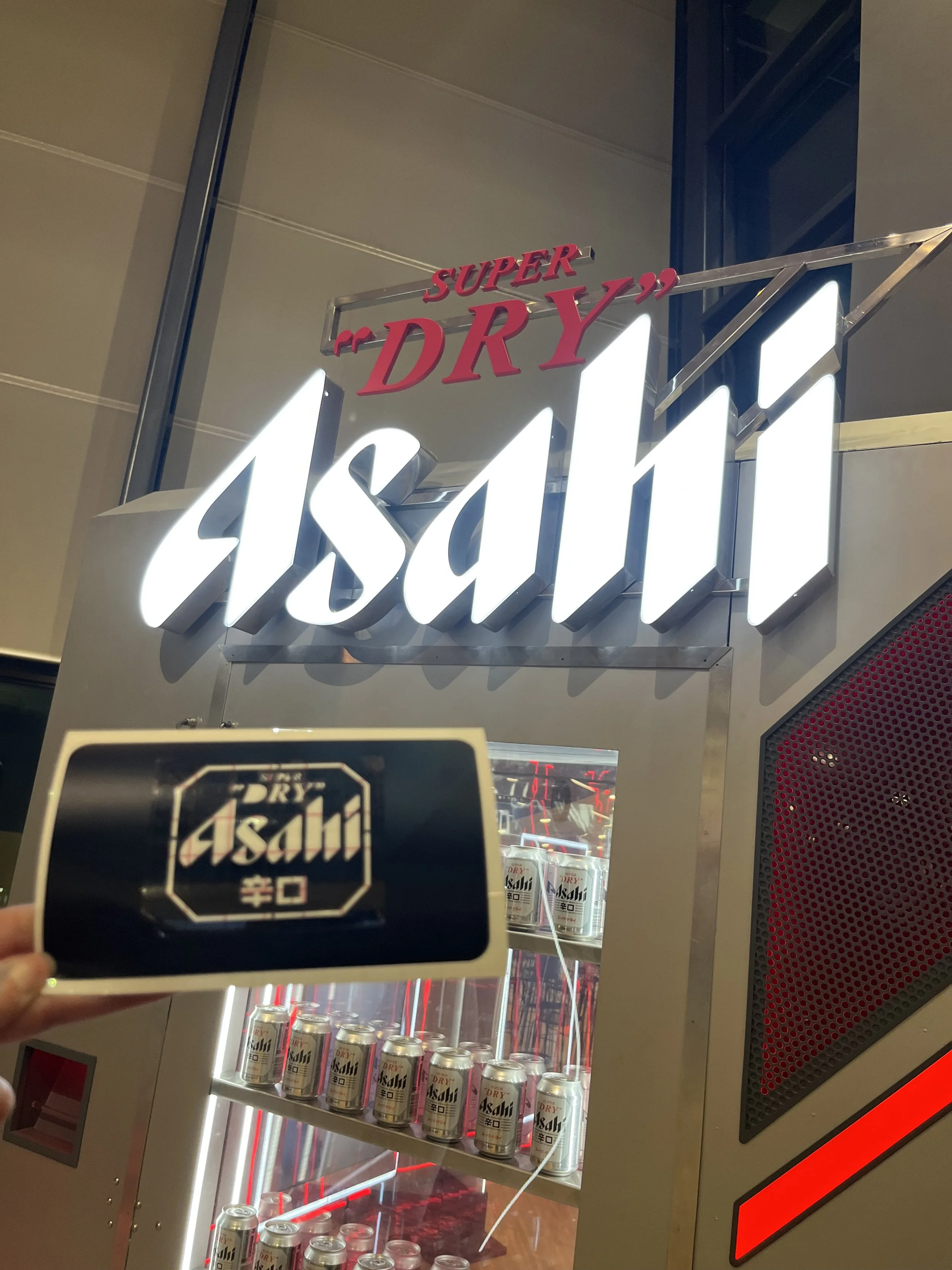 "Airbrush artist personalising clothing at branded event"