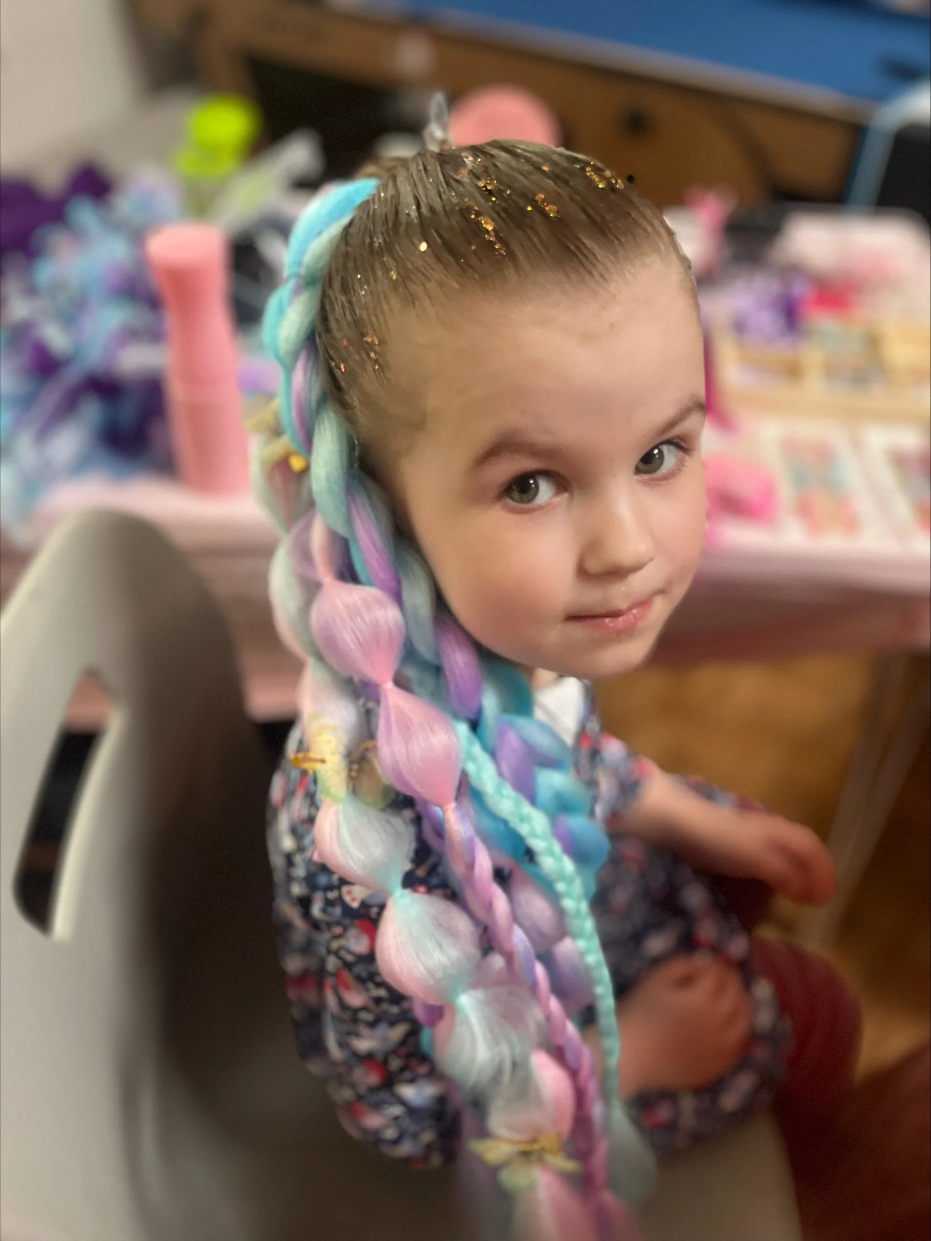 “Creative bubble braids and bright braid extensions for children’s parties in Wandsworth.”